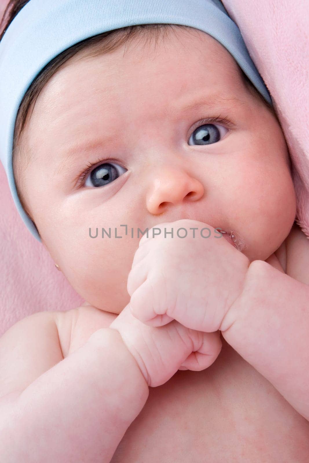 Adorable baby newborn with blue eyes