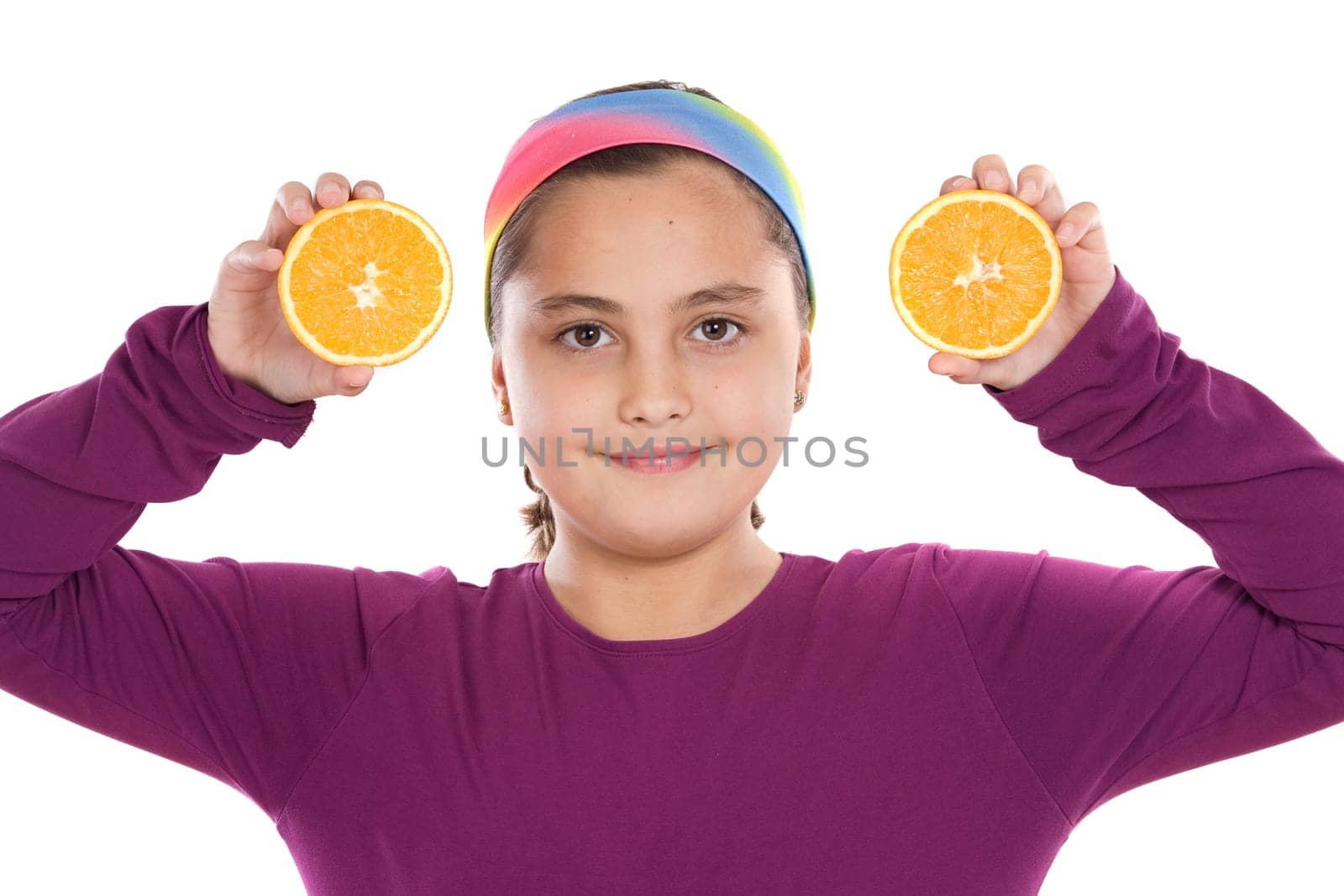 Attractive girl with oranges