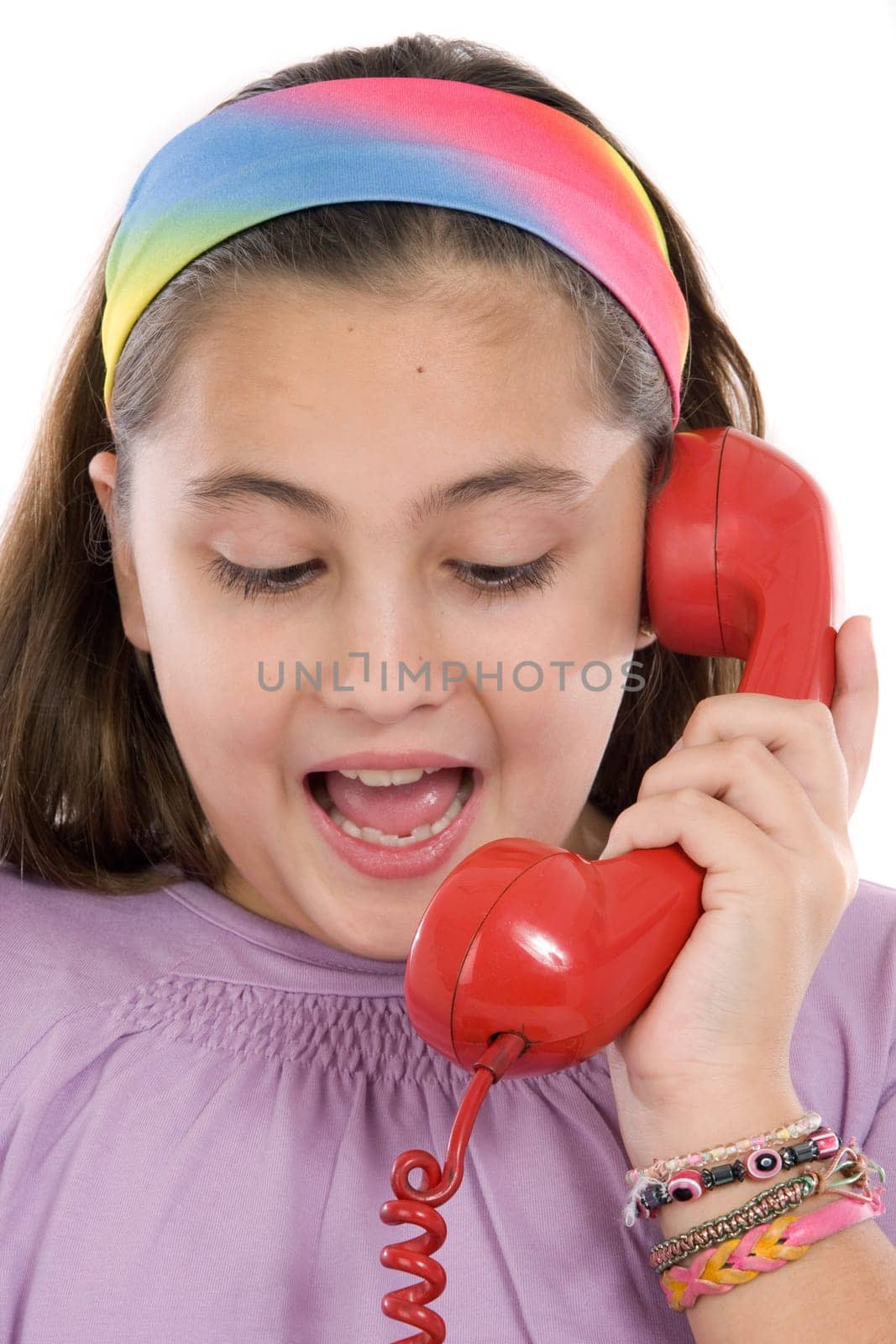 Beautiful girl with red telephone happy