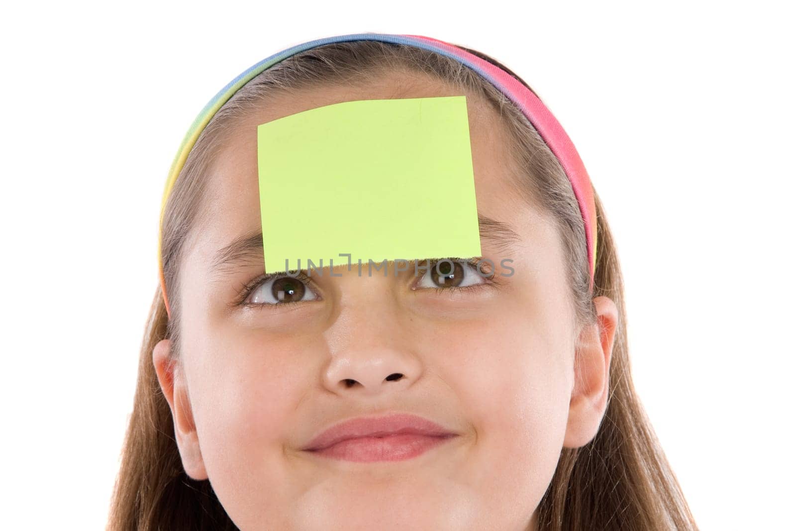 Adorable girl squint with post-it