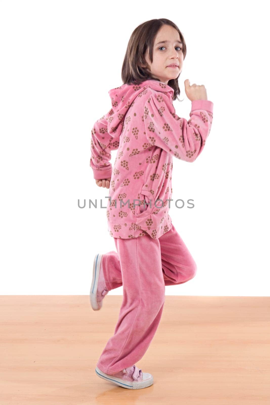 Joyful little girl running