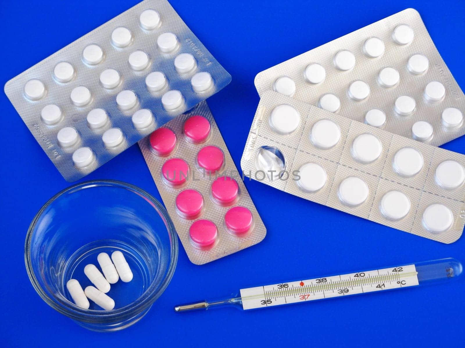 medical pills and thermometer - detail
