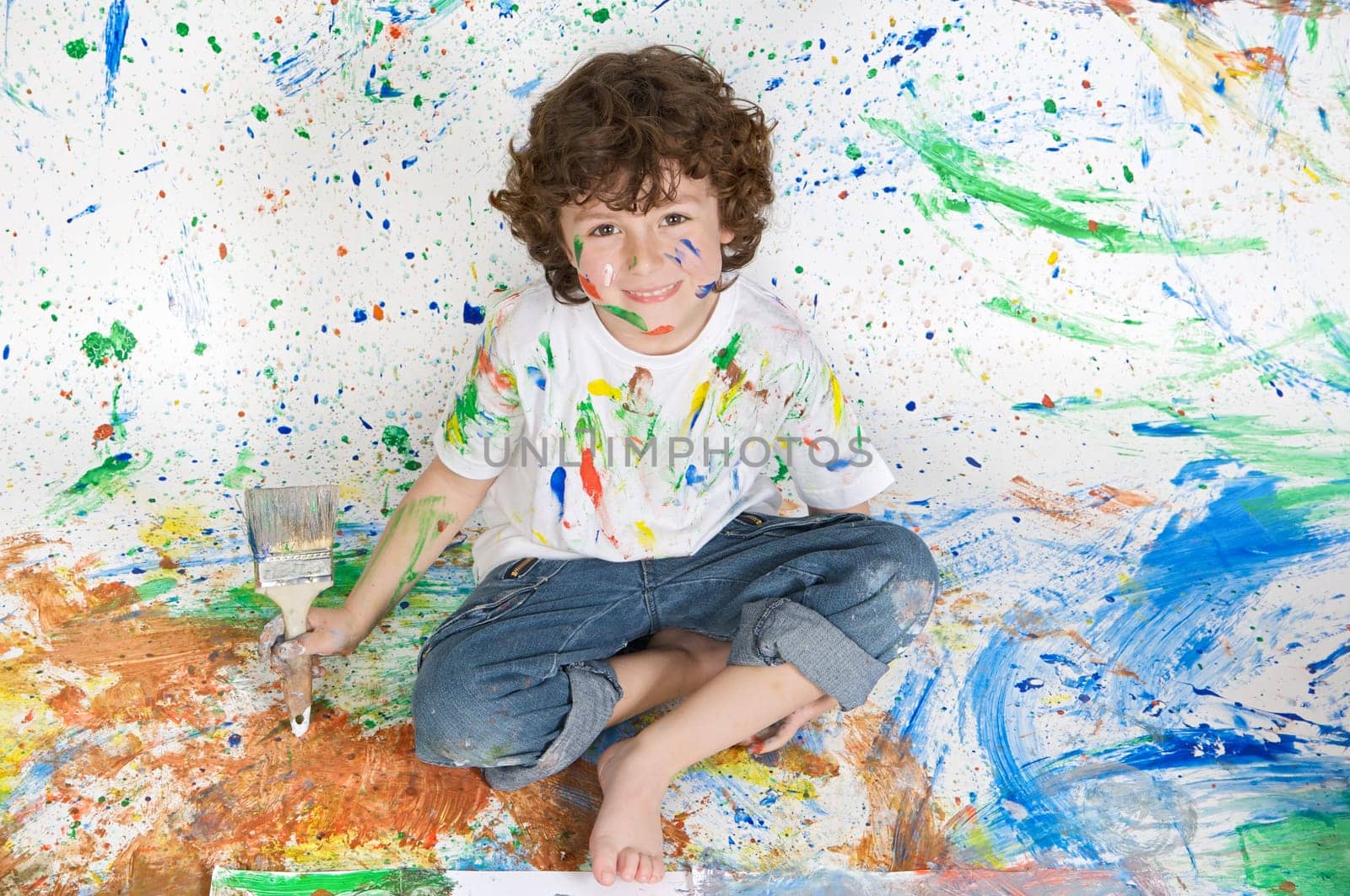 Boy playing with painting