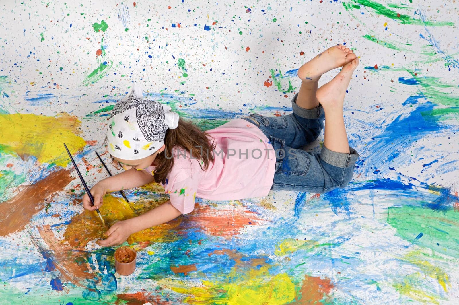 Girl playing with painting