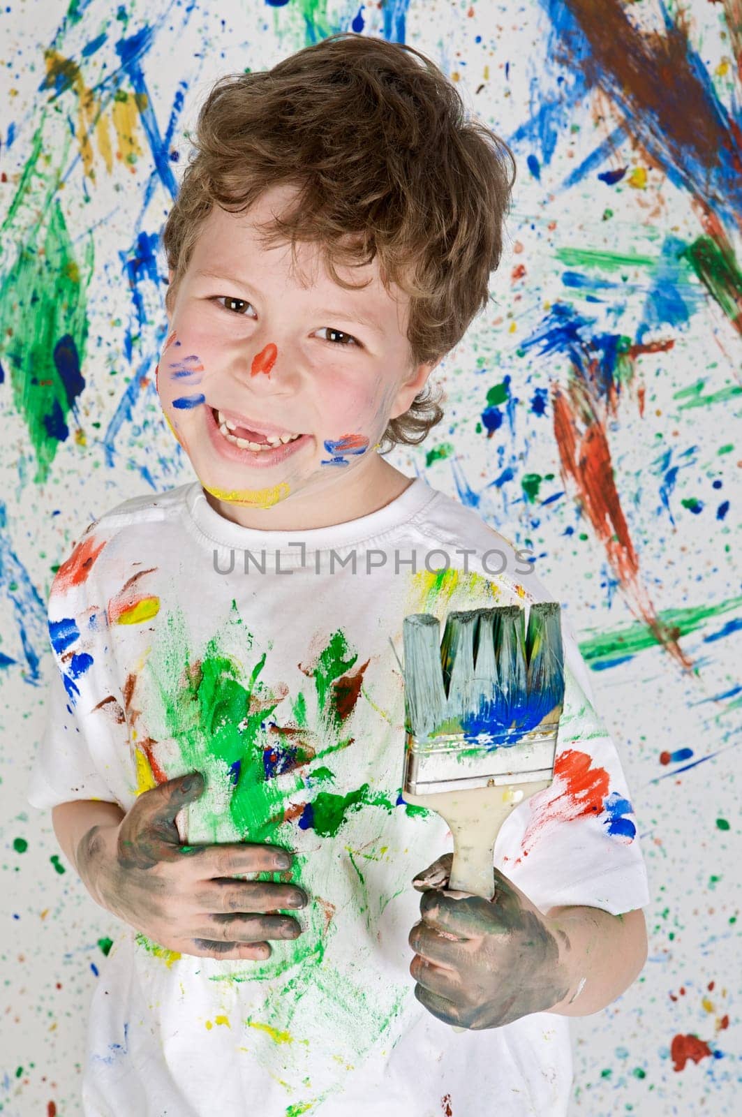 Boy playing with painting