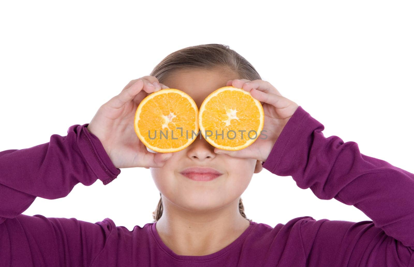 Attractive girl with oranges