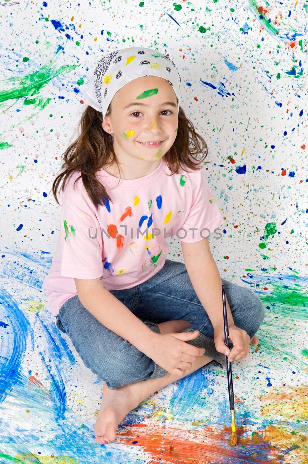 girl playing with painting