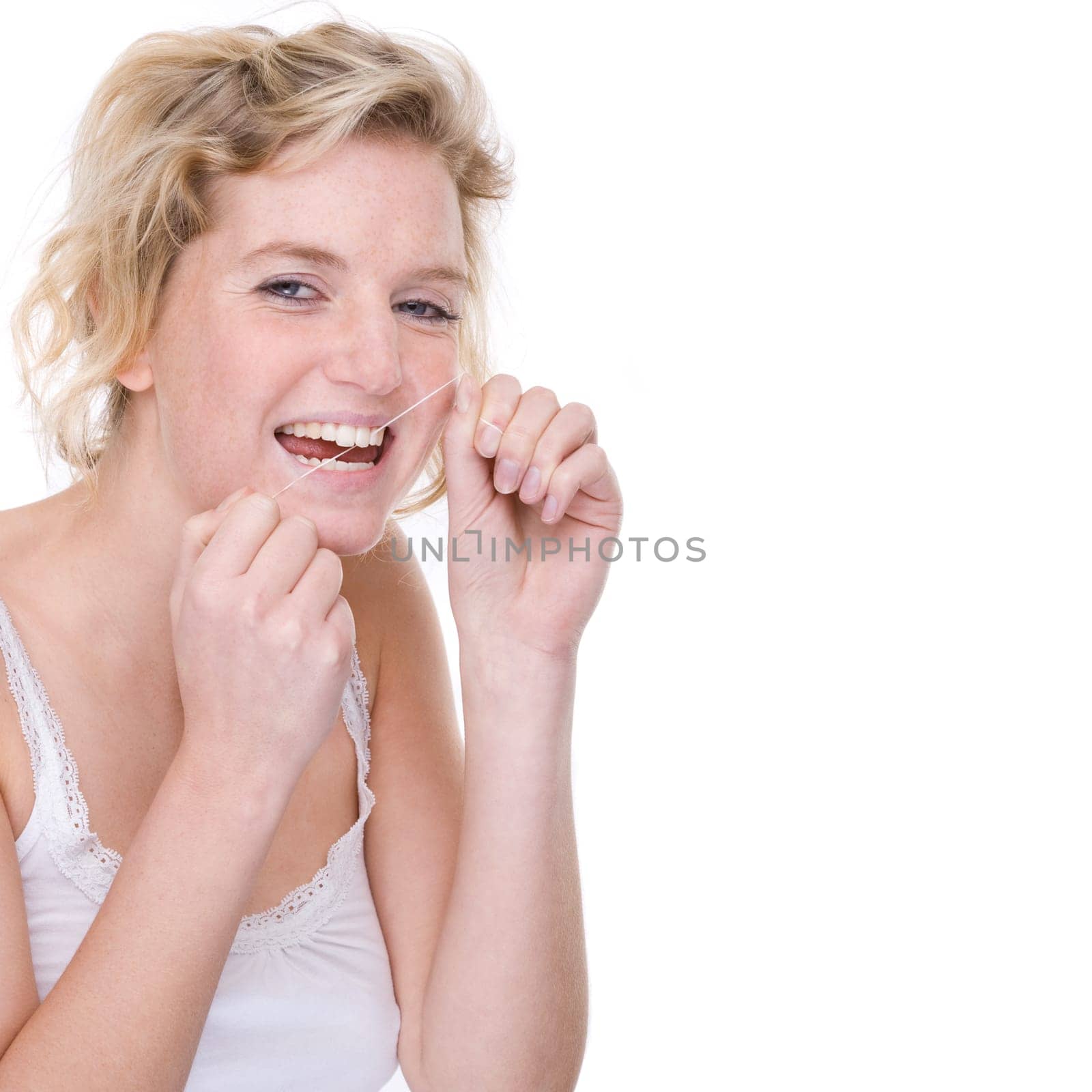 Young woman with dental floss