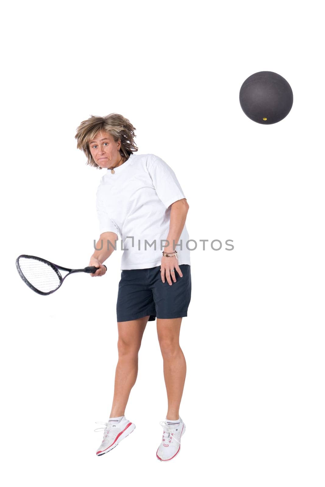 Woman playing squash