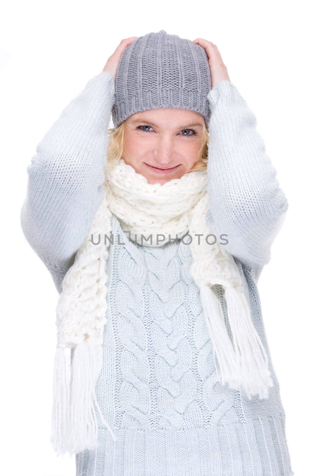 Young woman with sweater and cap