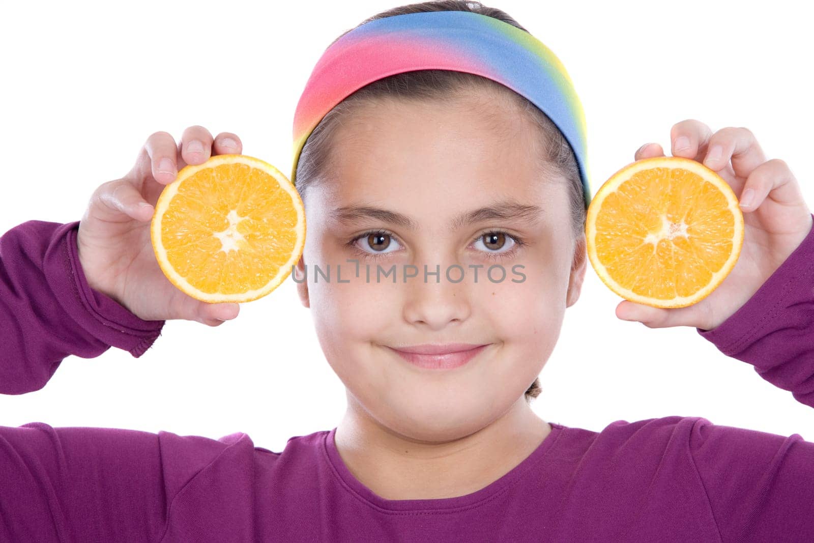 Attractive girl with oranges