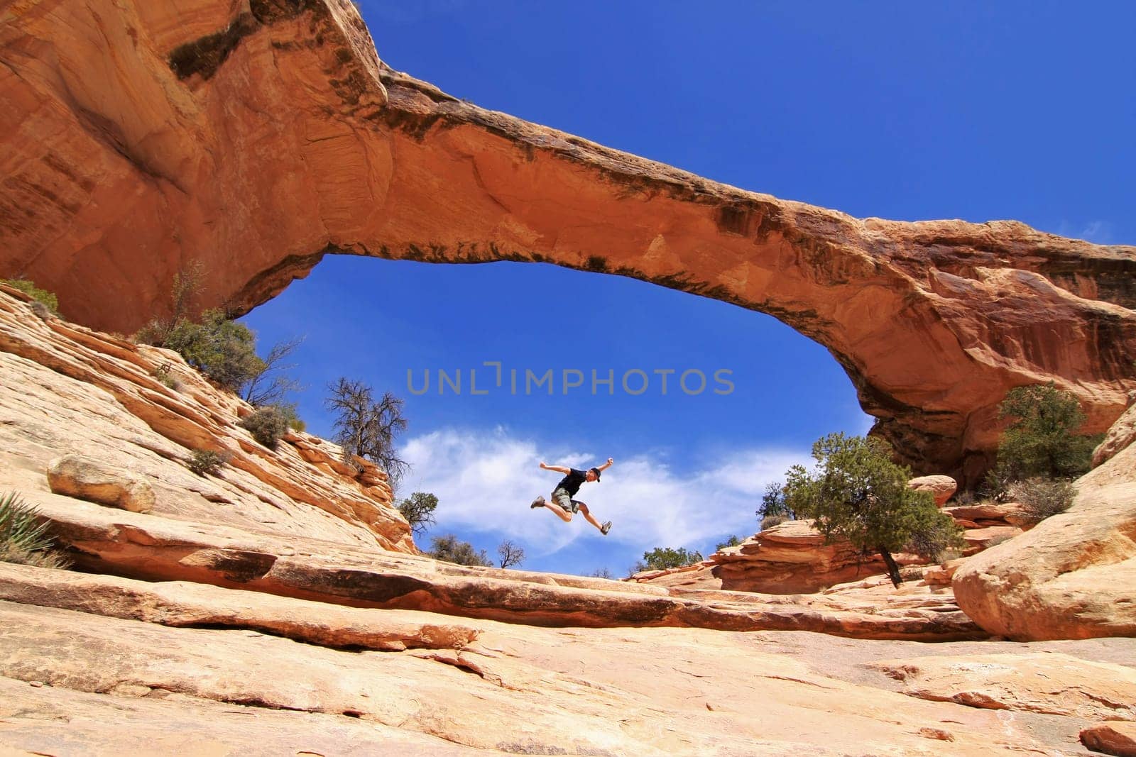 Man jumping inside of Owachomo Bridge