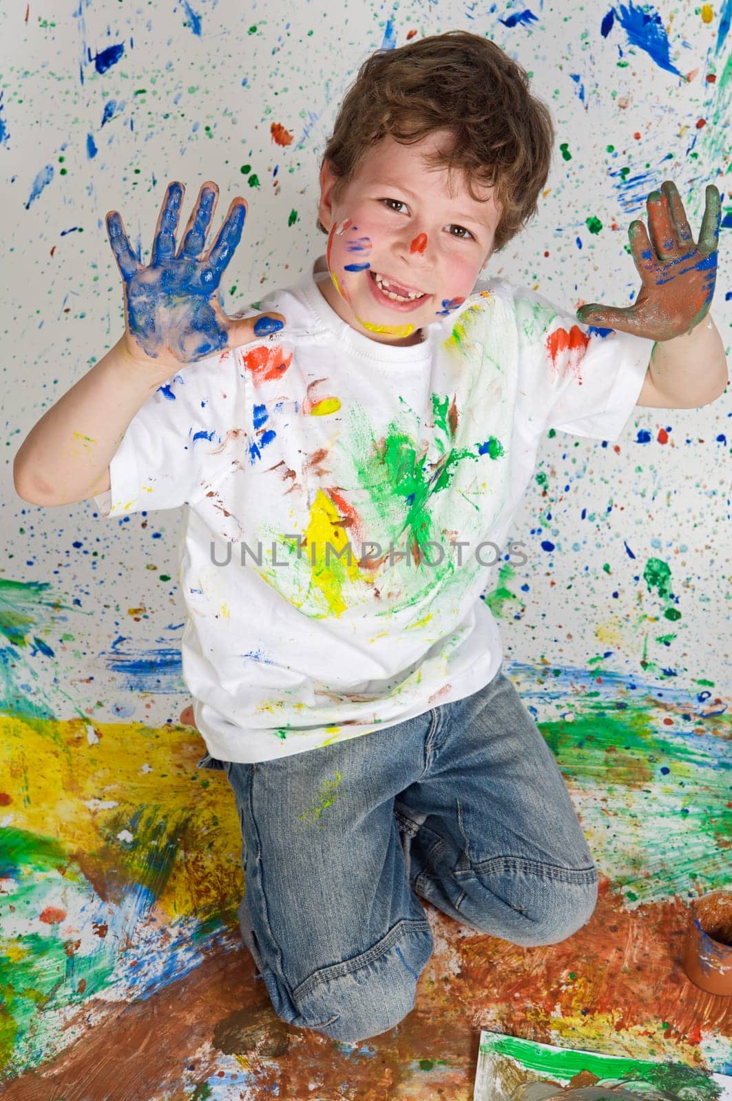 Boy playing with painting