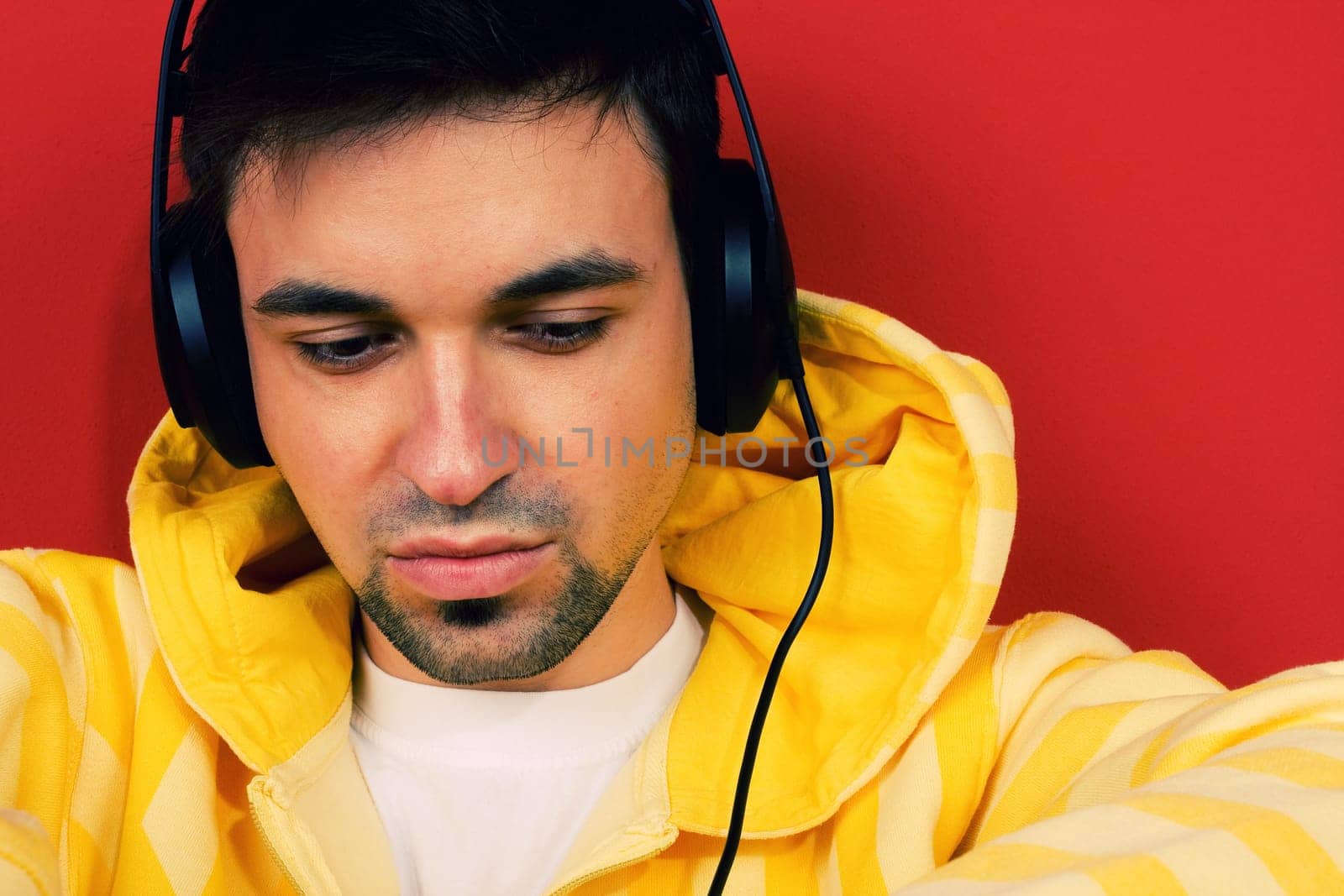 Young man listen music