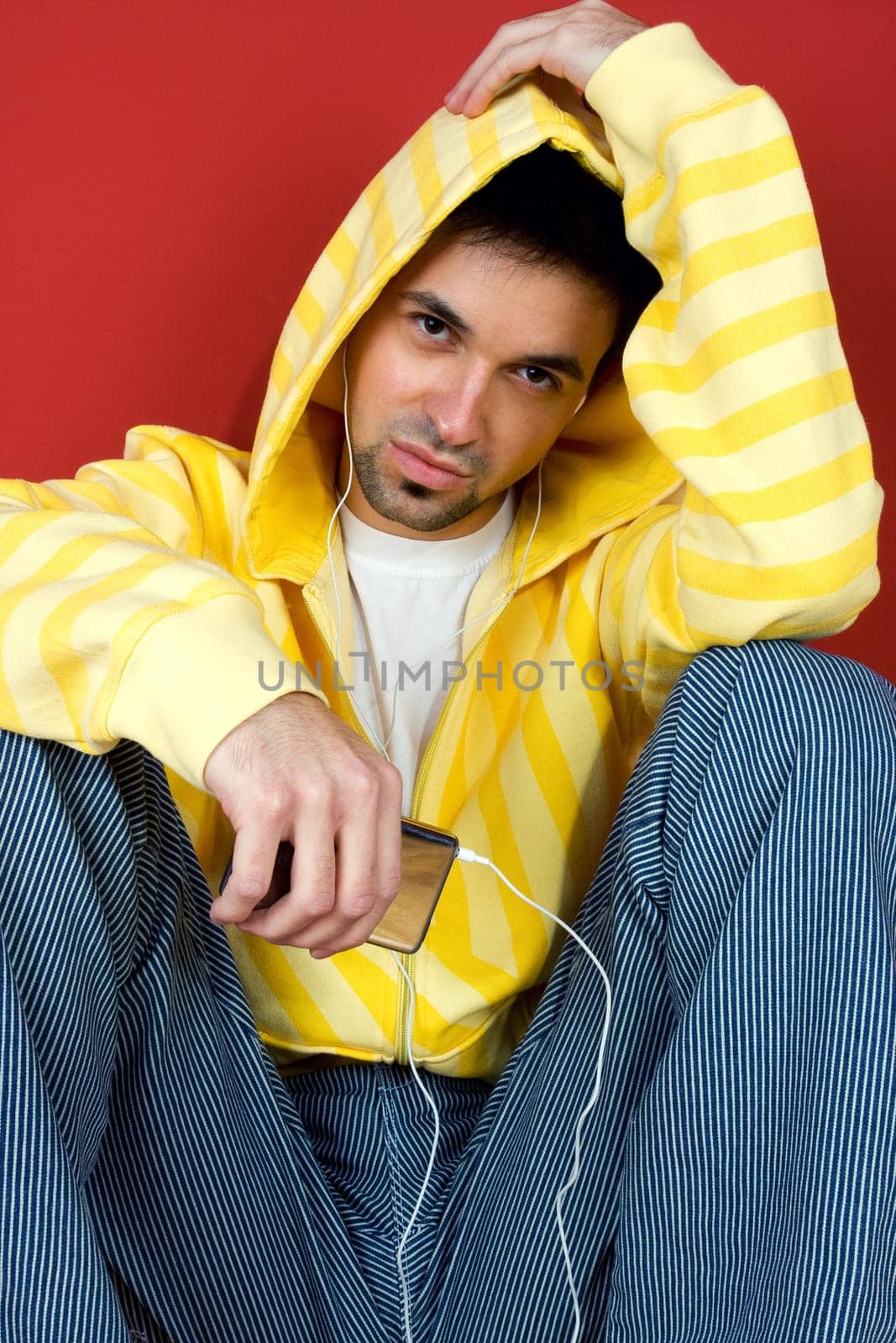Young man listen music