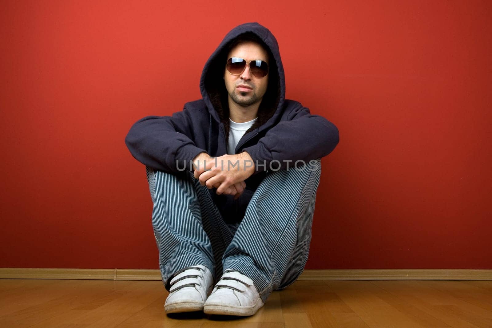 Sitting Young Man with eye-glasses