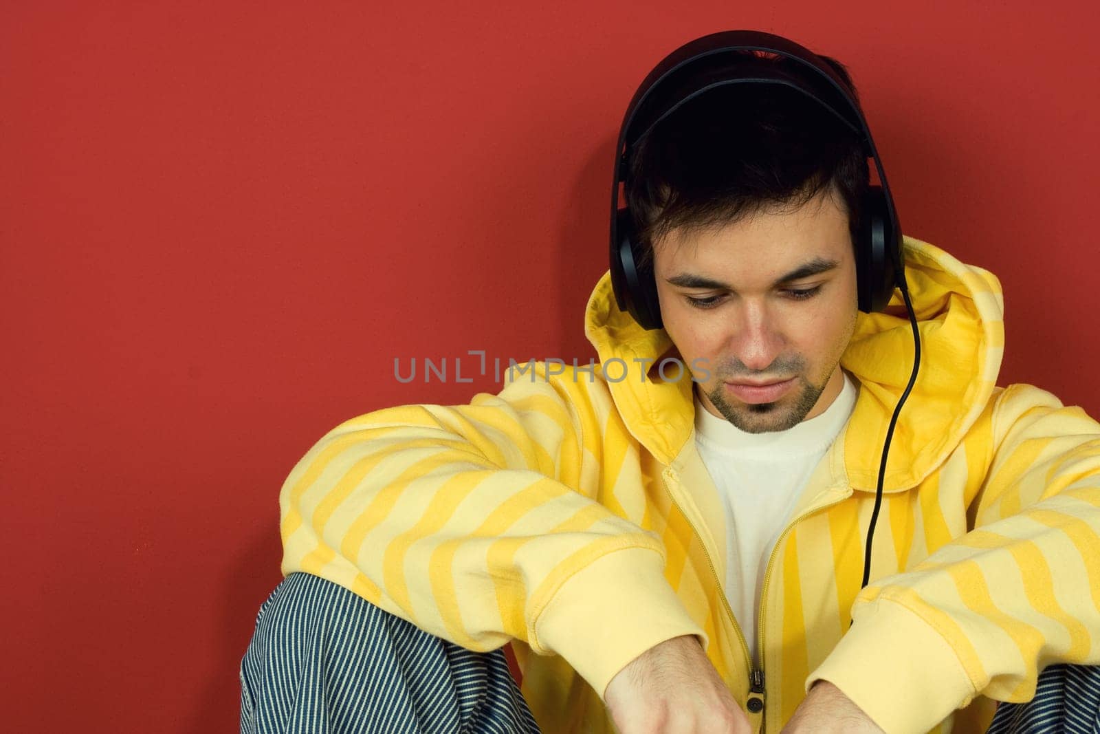 Young man listen music