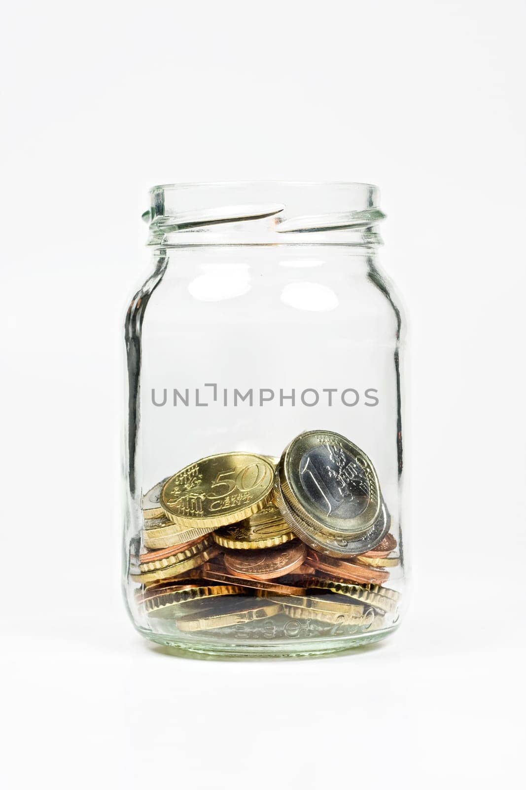 A jar with some small Euro coins inside