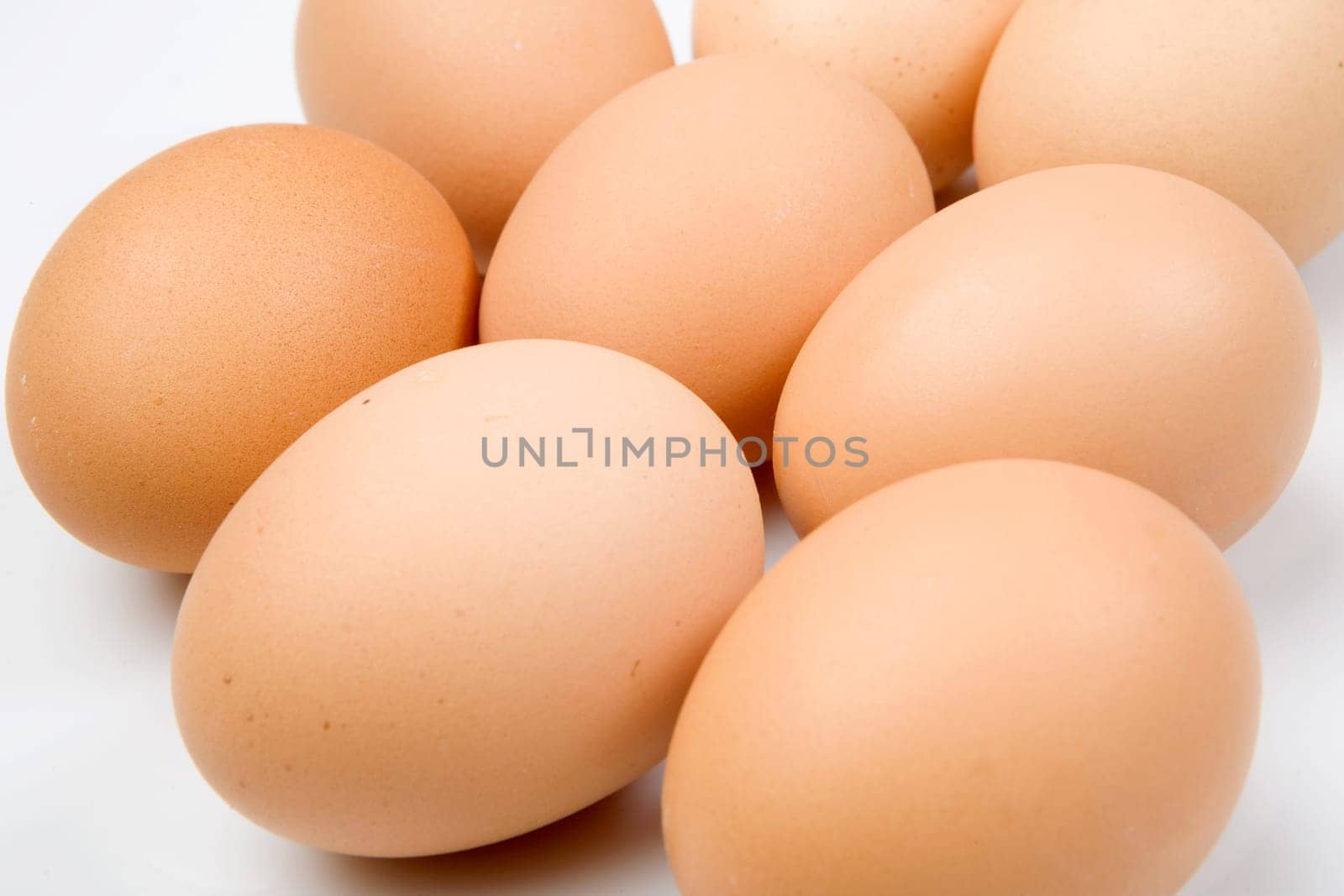 Photo of many brown hen eggs