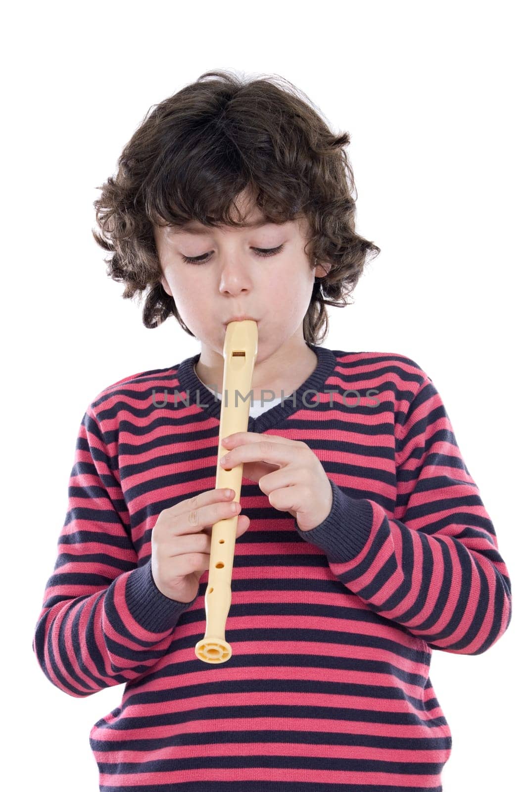 Adorable child playing flute