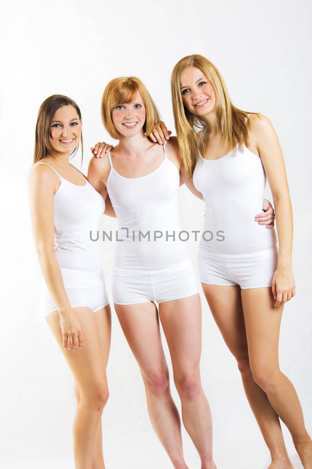 three young women in white underwear