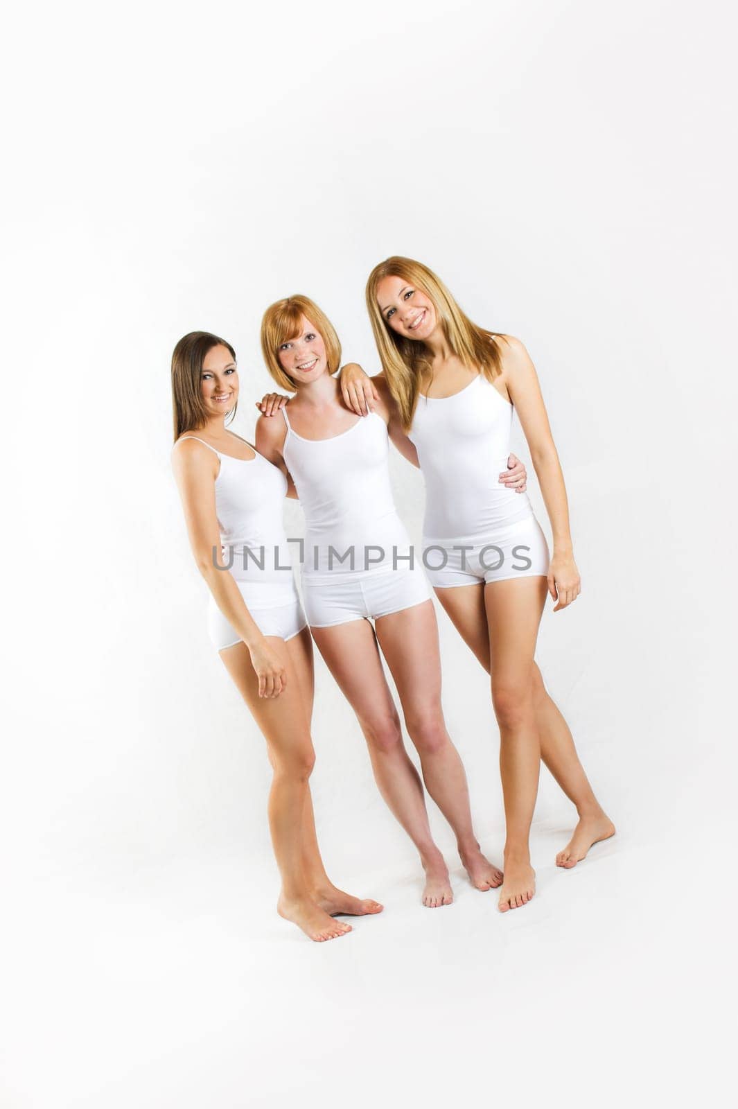 three young women in white underwear
