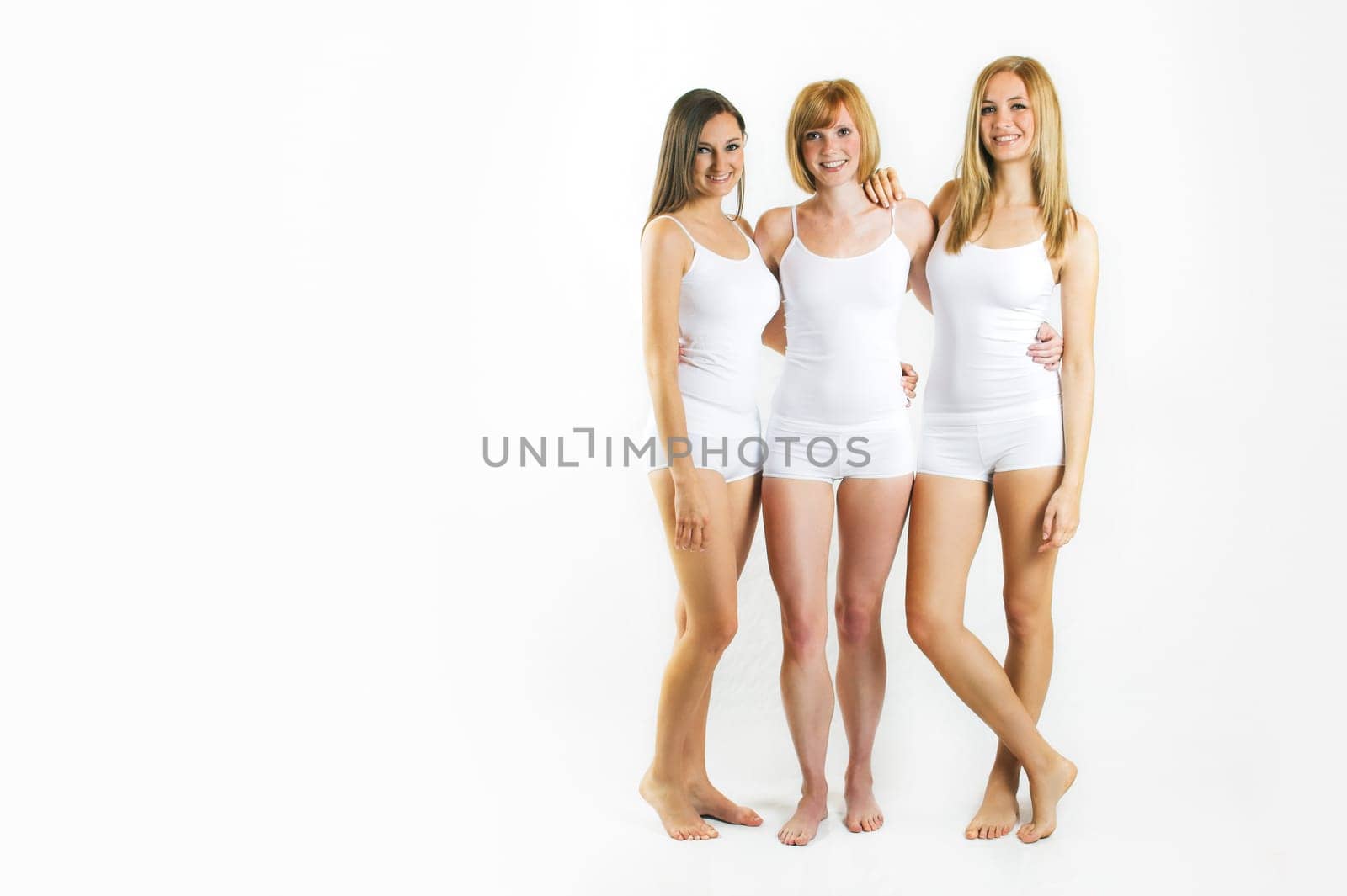 three young women in white underwear