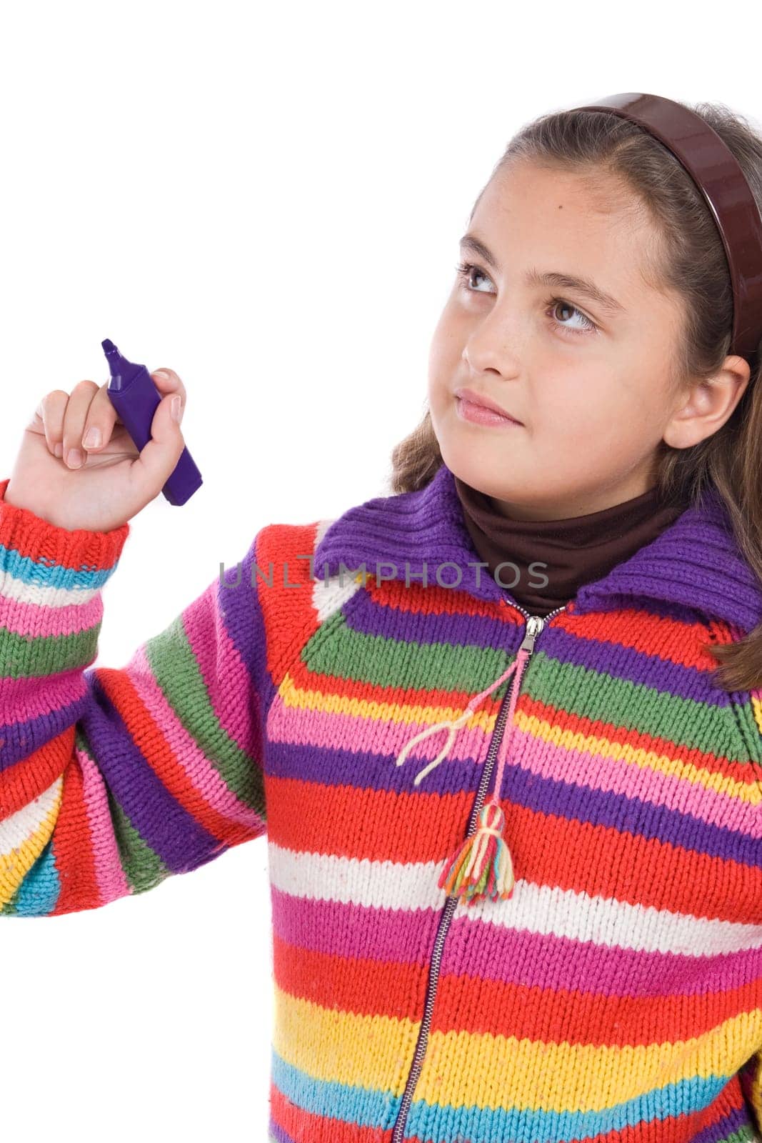 Adorable girl writing with fluorescent