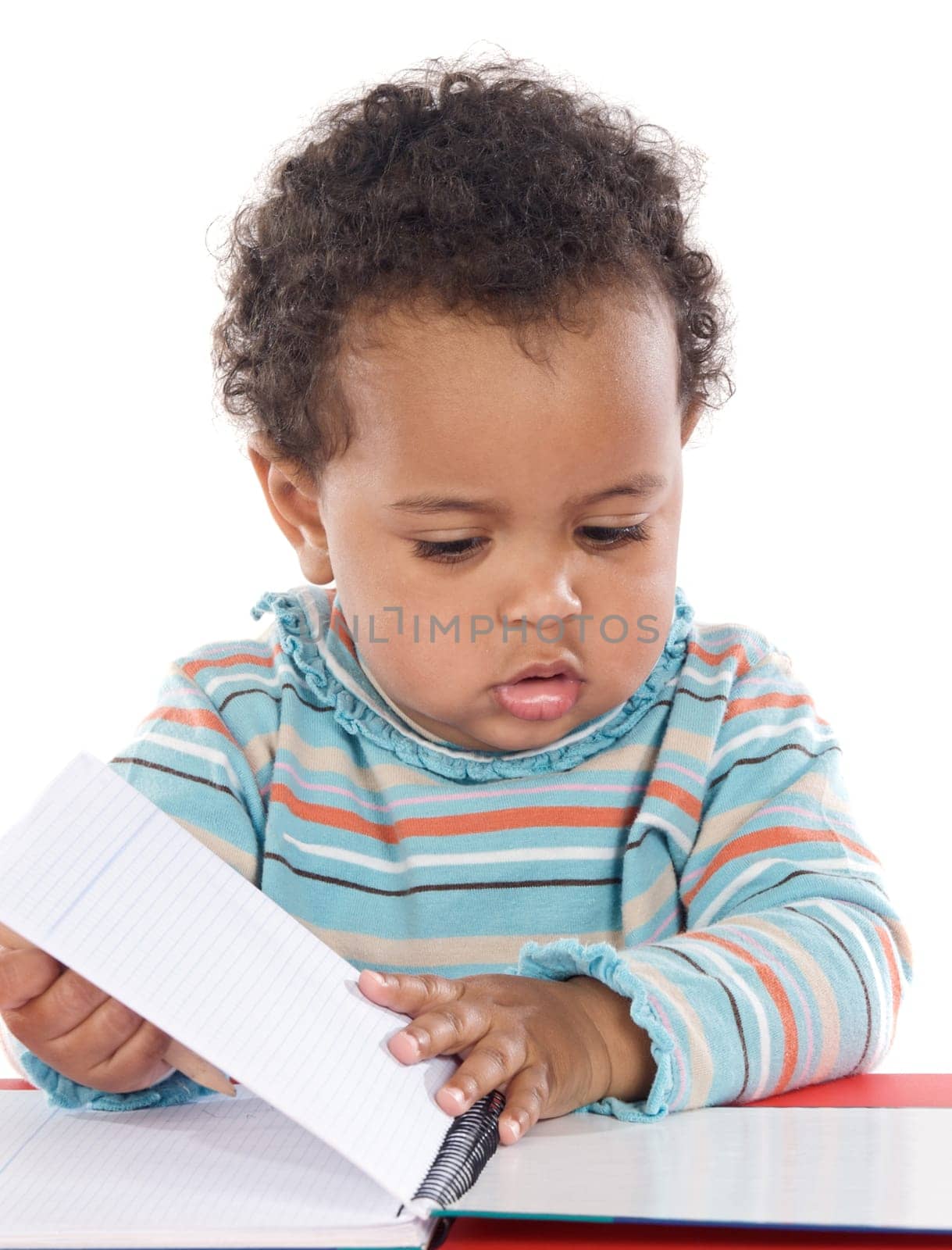 Adorable baby studying