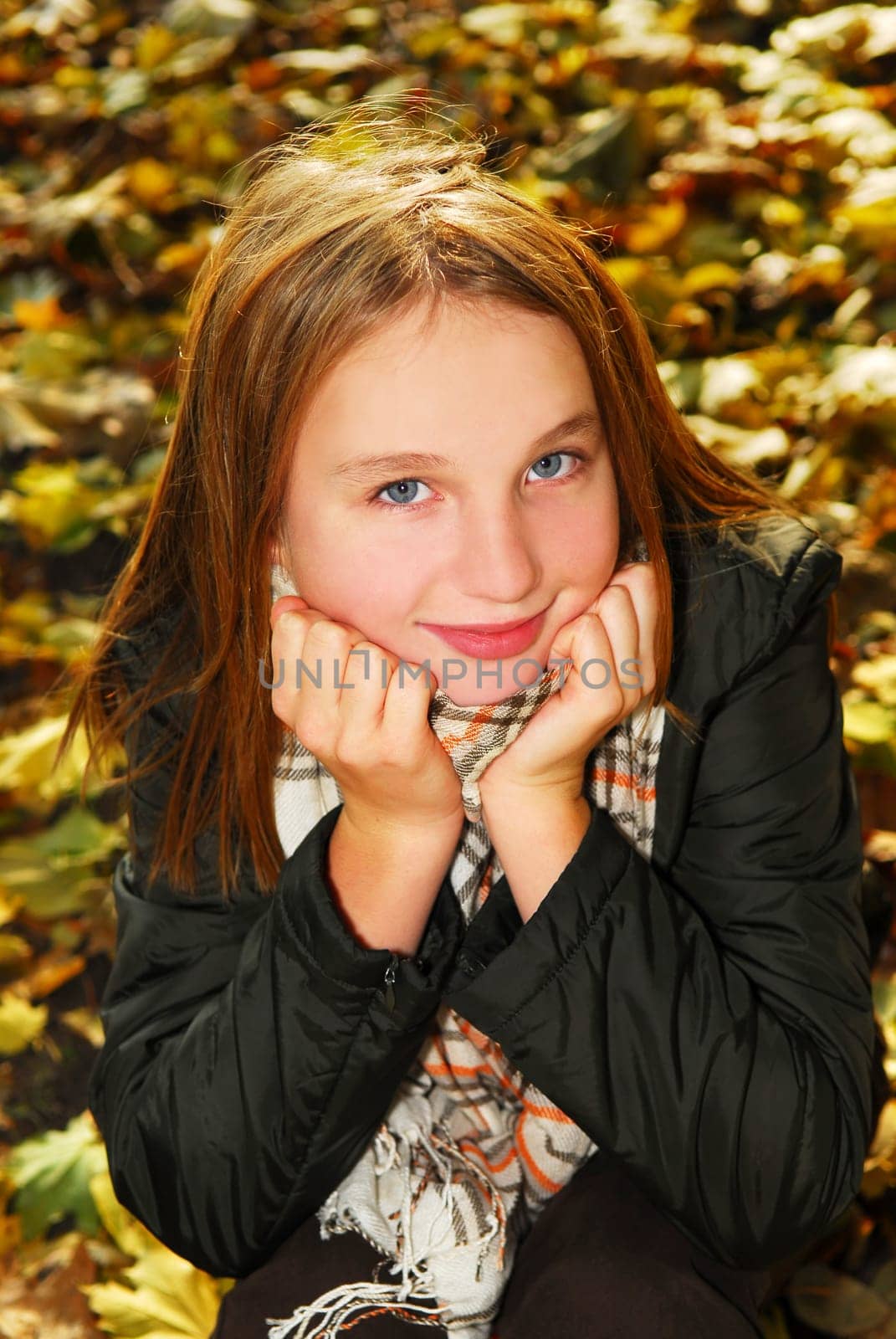 Girl in a fall park