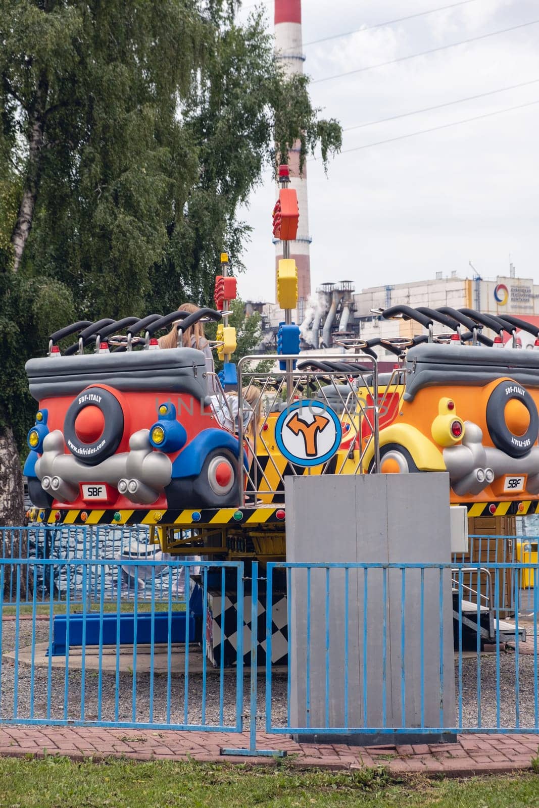 21.07.2023, Kemerovo, Russia. An amusement park with carousels for people to relax. Dangerous carousels in the city amusement park.