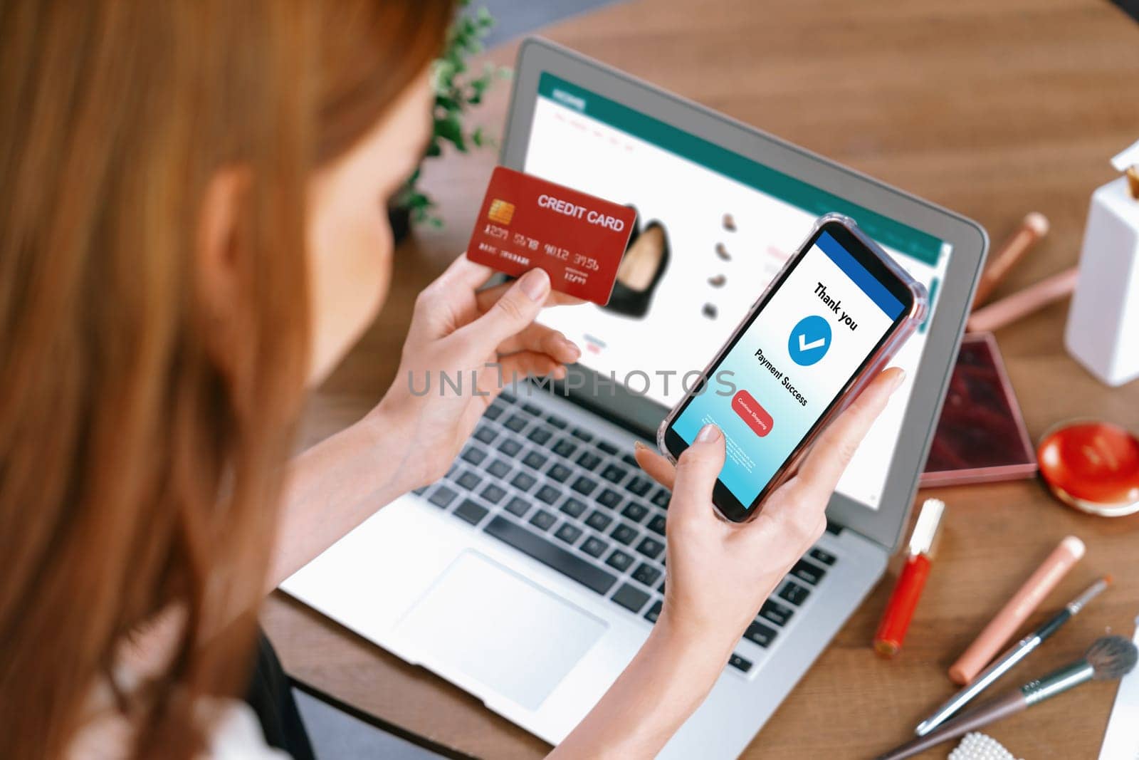 Woman shopping online on internet marketplace browsing for sale items for modern lifestyle and use credit card for online payment from wallet protected by utmost cyber security software