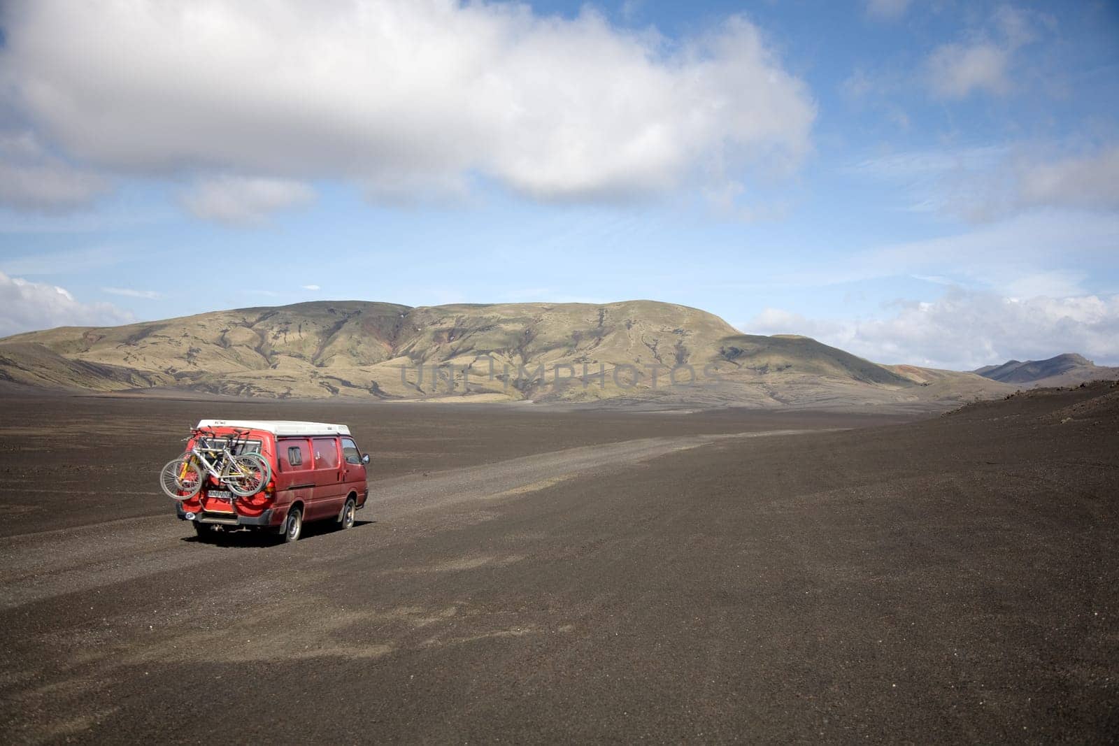 Driving through the lava sand desert