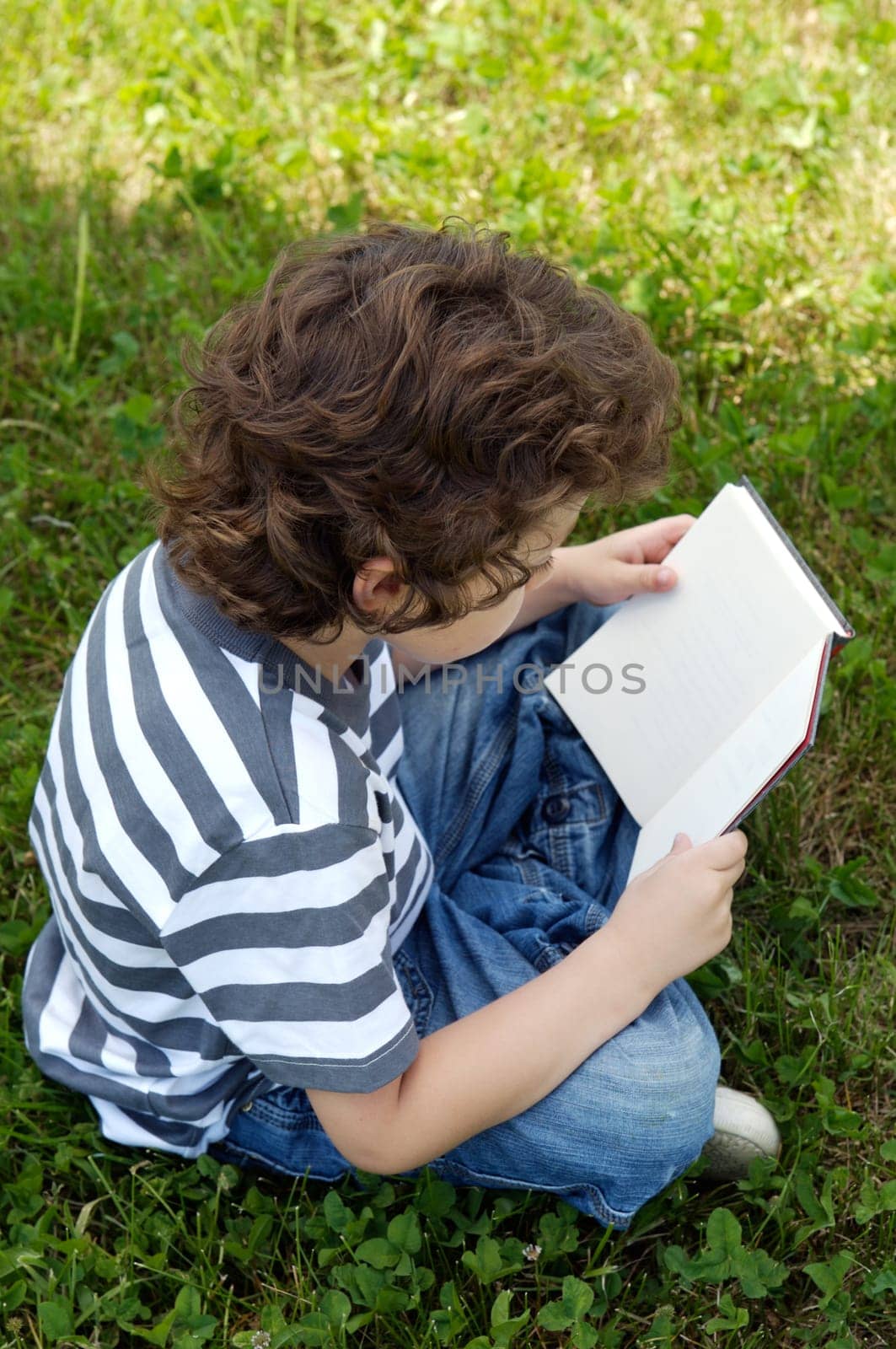 Child reading a book