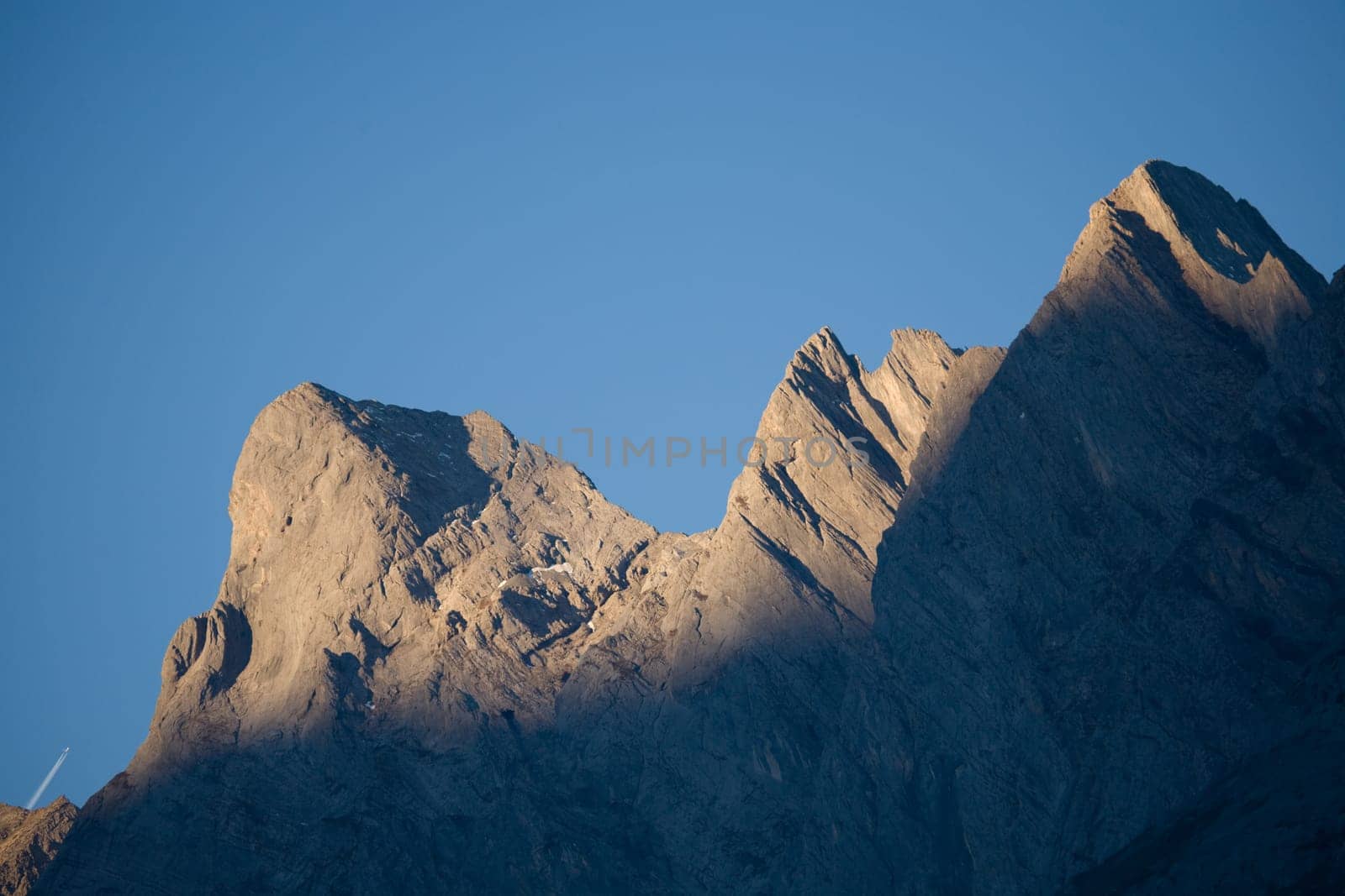 Mountain peaks in the morning sun