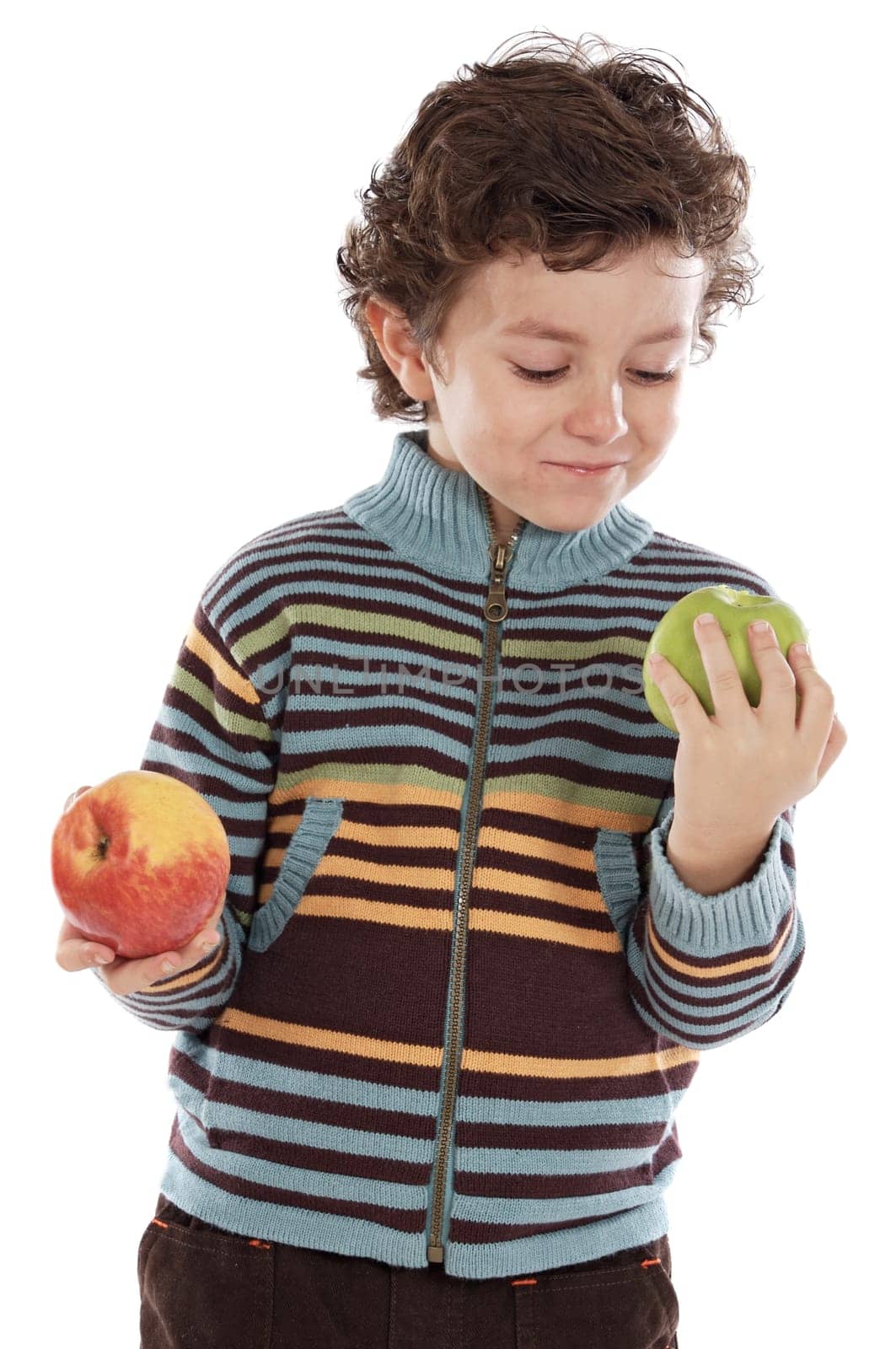 child eating two apples
