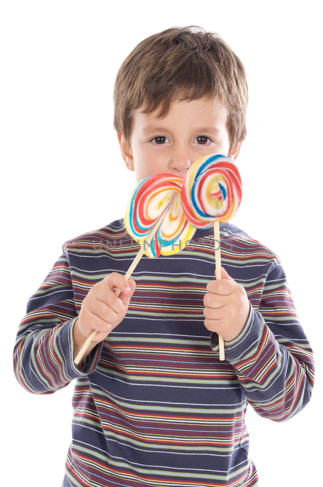 Child eating two lollipops