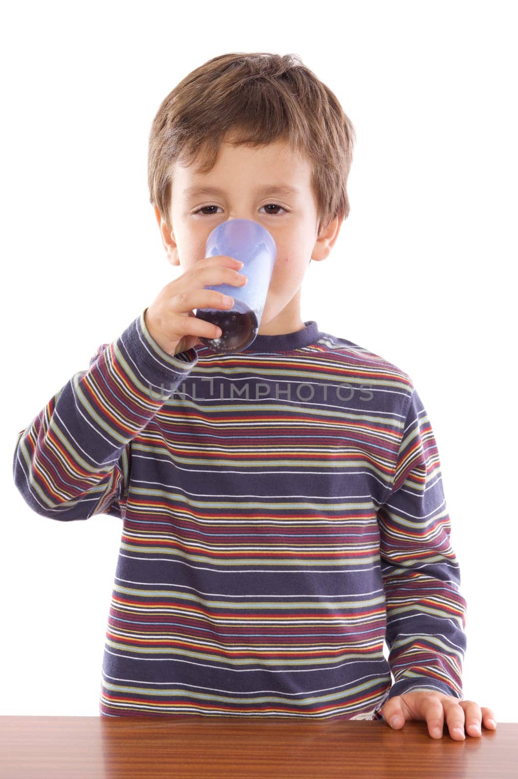 Child drinking a soda