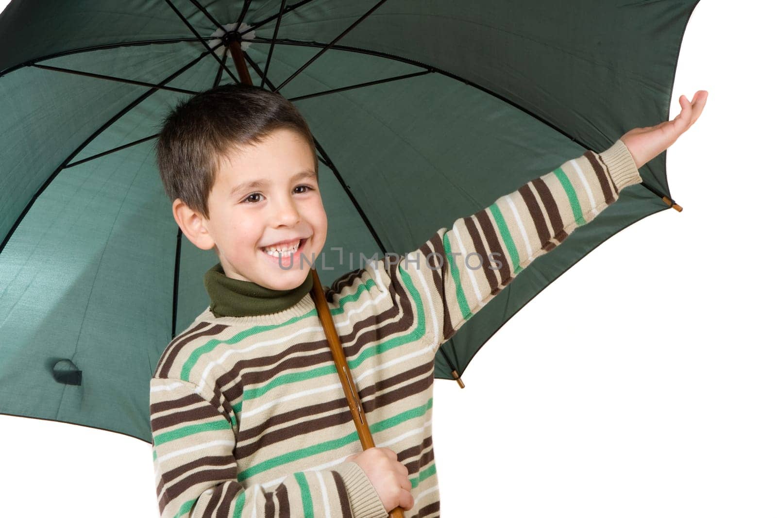 Adorable boy with open umbrellas
