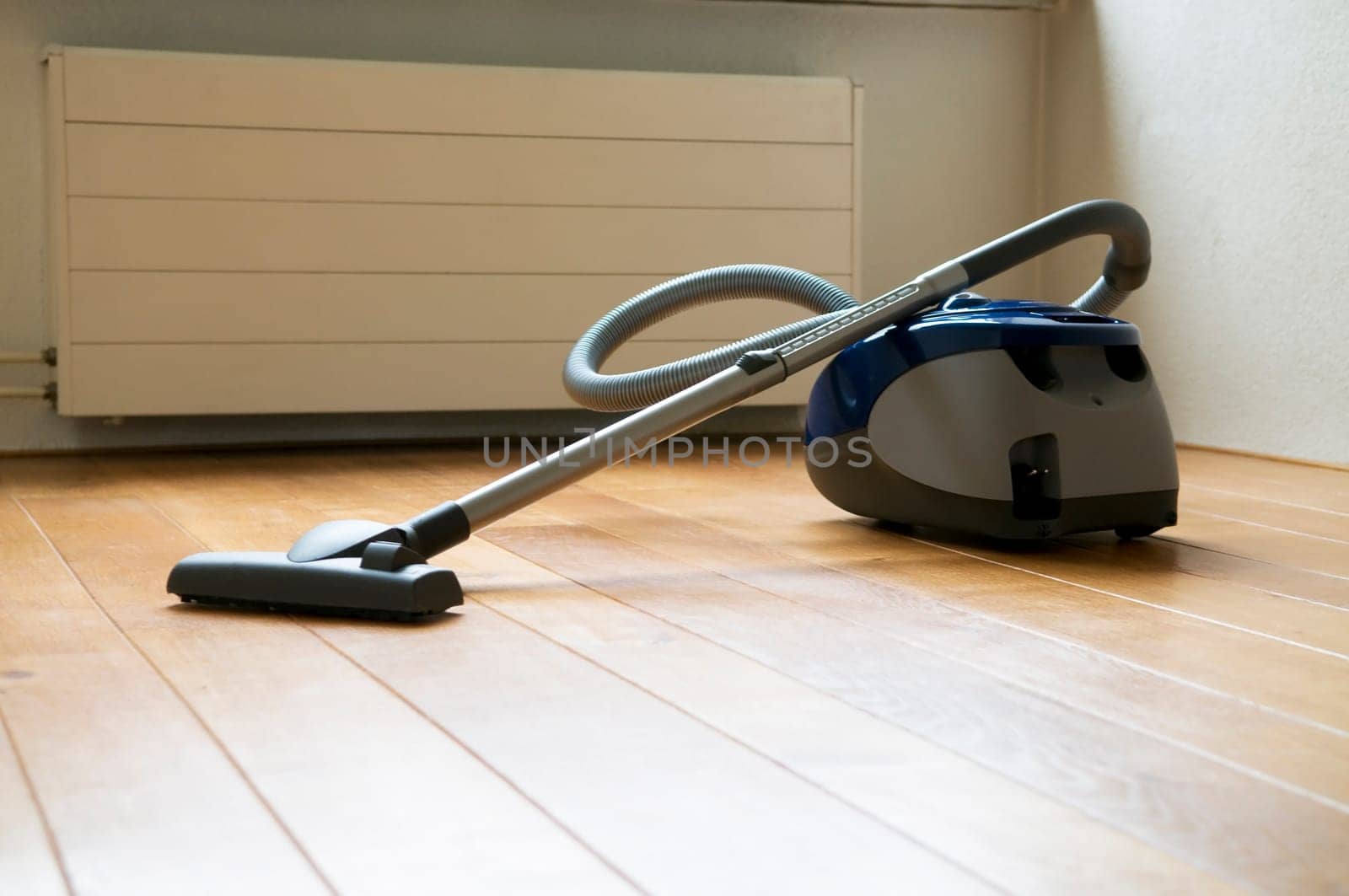 Empty Room with vacuum cleaner