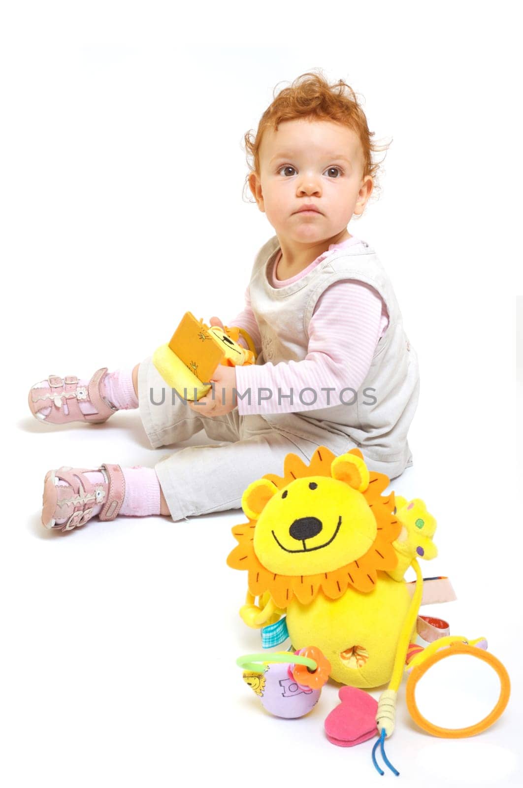 Redhead baby playing