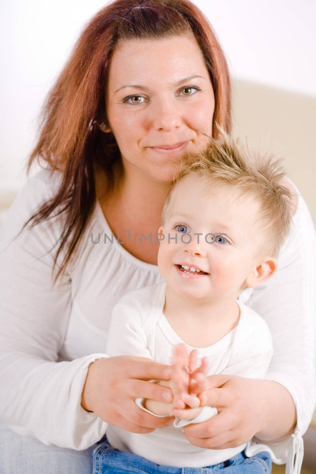 Mother and baby clapping
