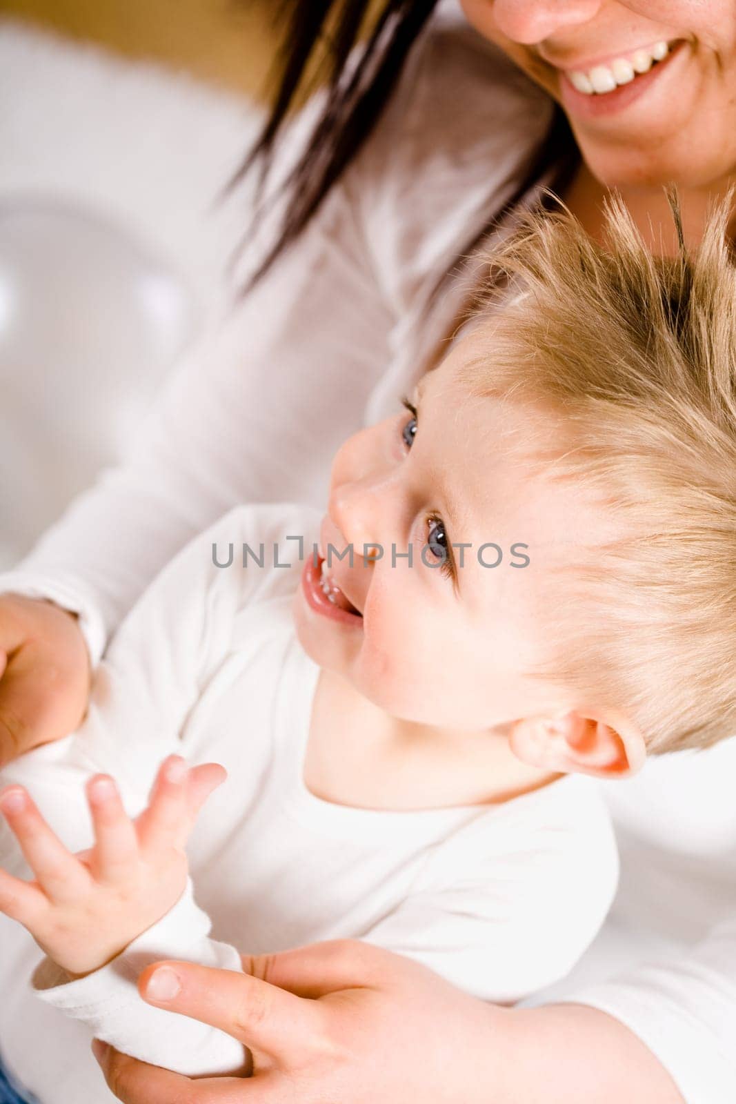 Mother and baby clapping