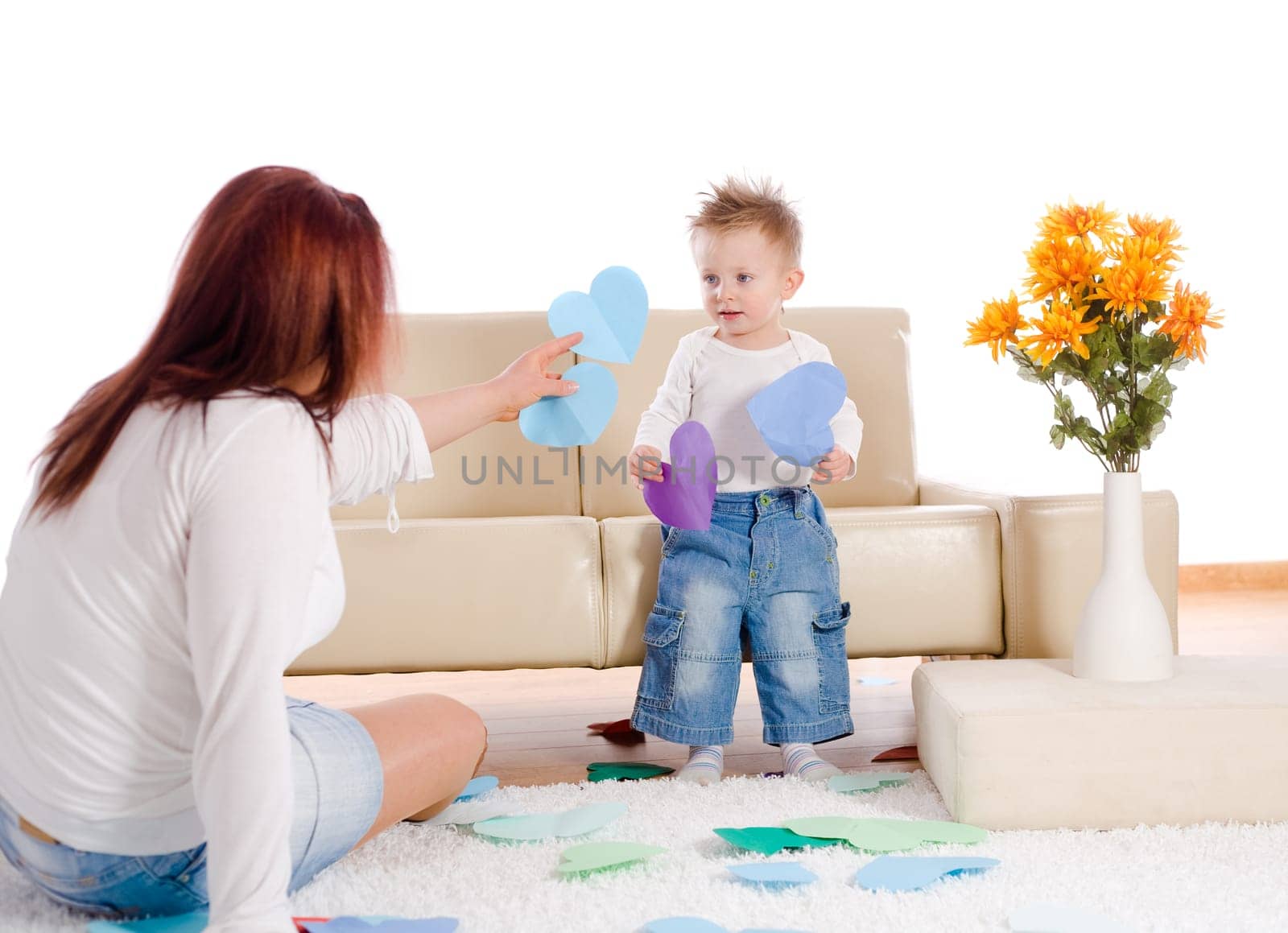 Mother and baby playing at home