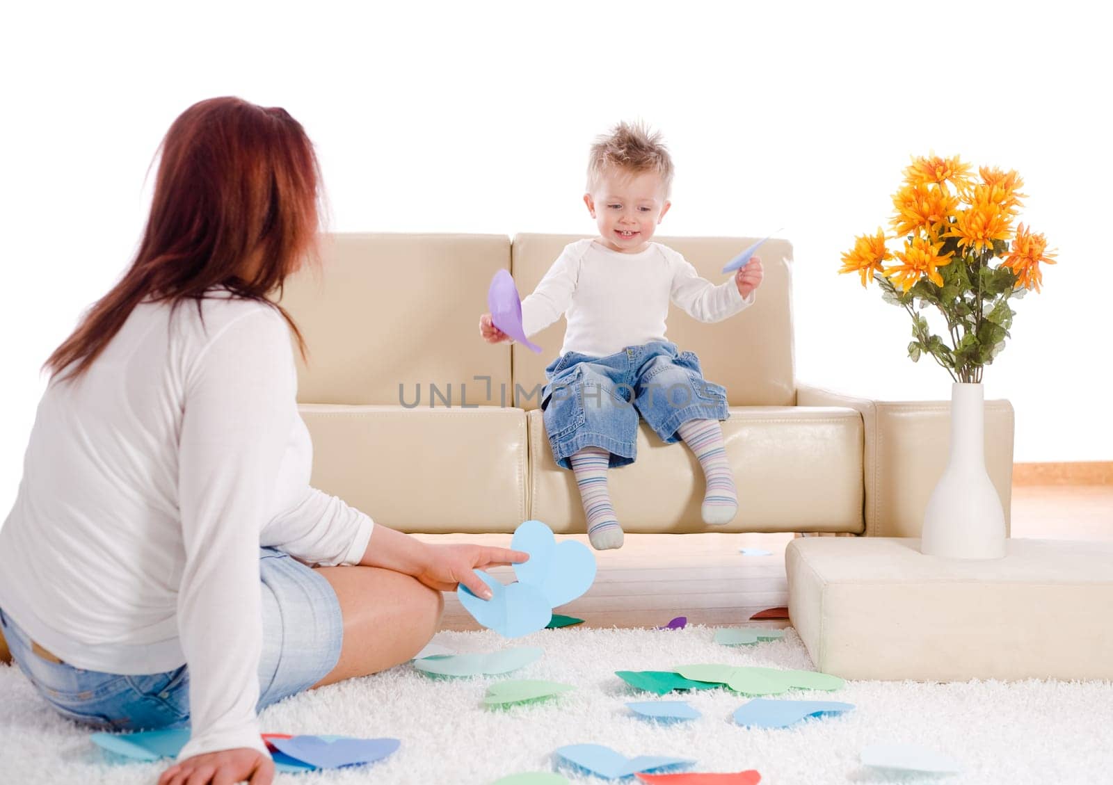 Mother and baby playing at home