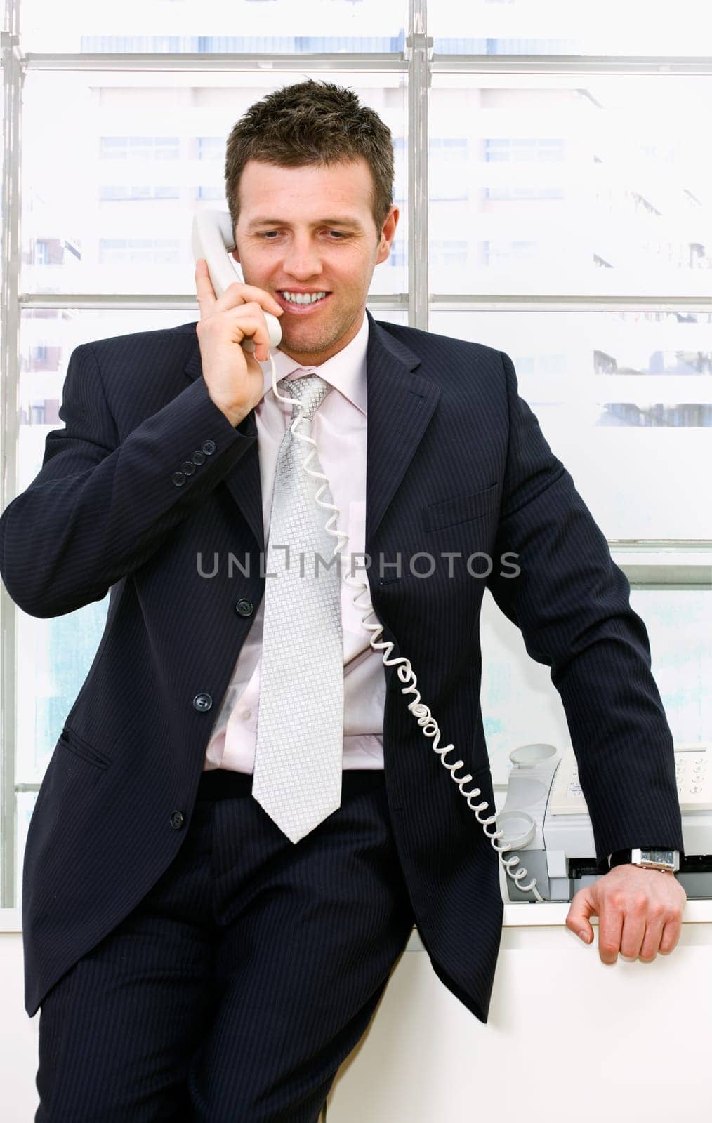 Businessman calling on phone