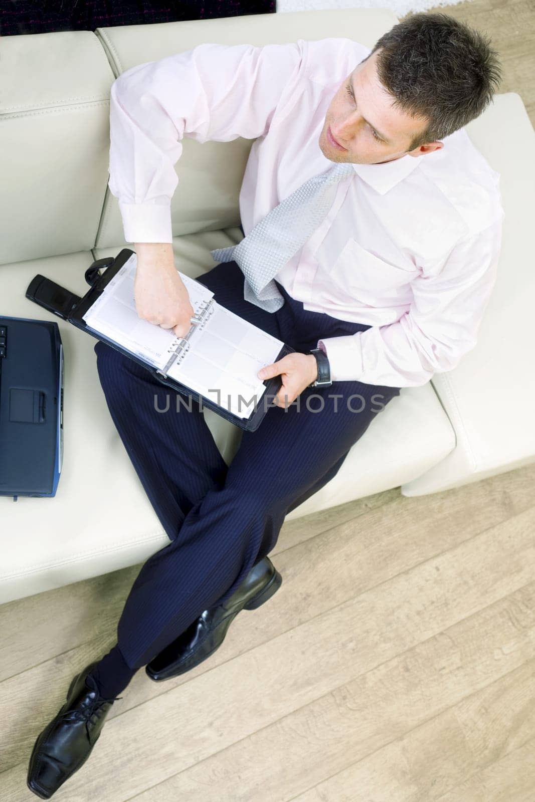 Businessman sitting on couch
