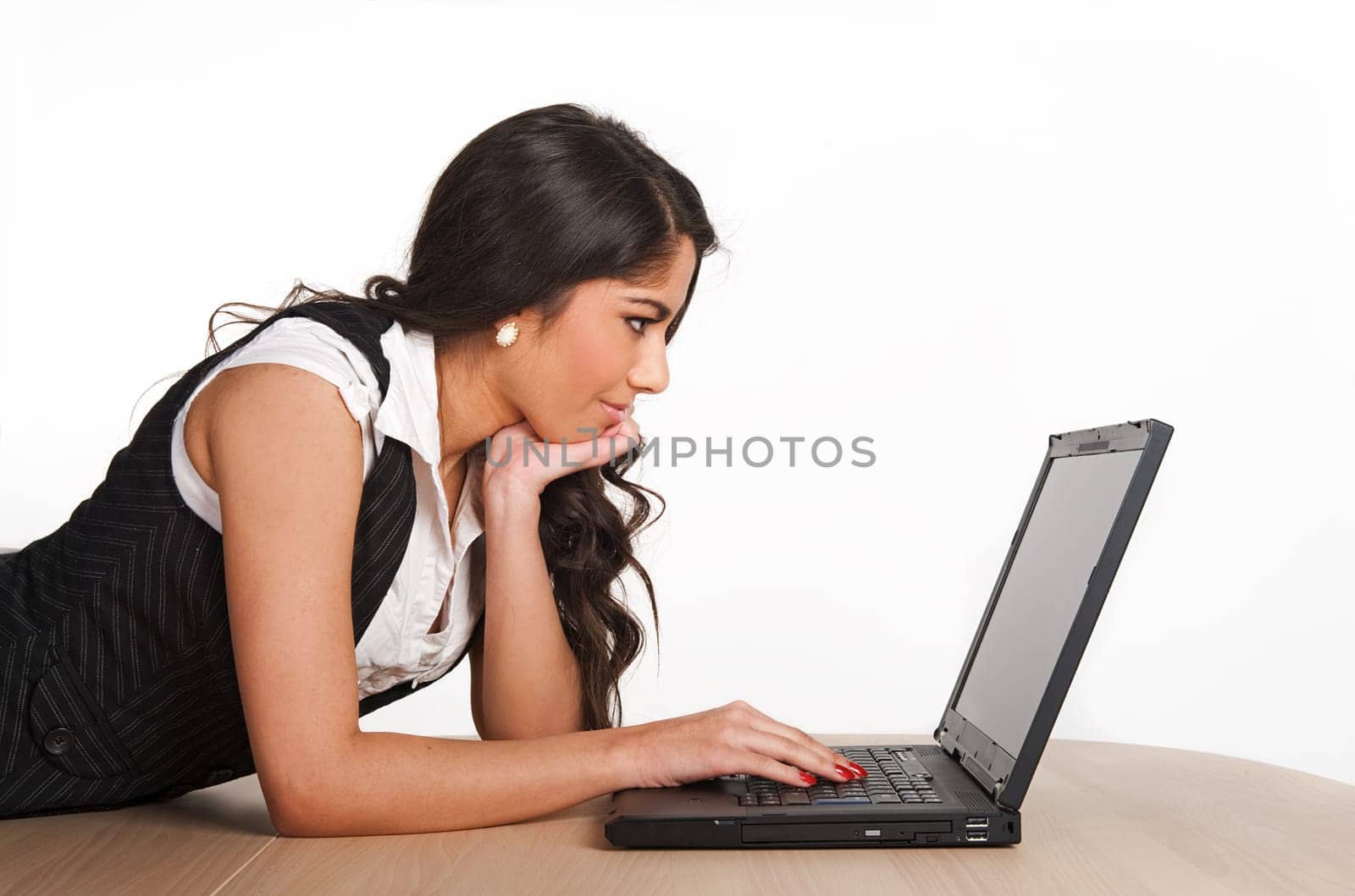 Beautiful girl focused on her computer