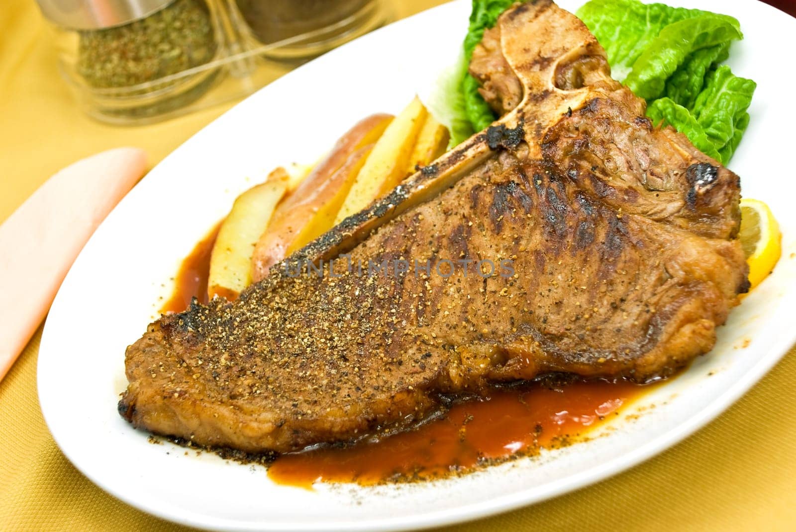 T-bone steak with red potatoes