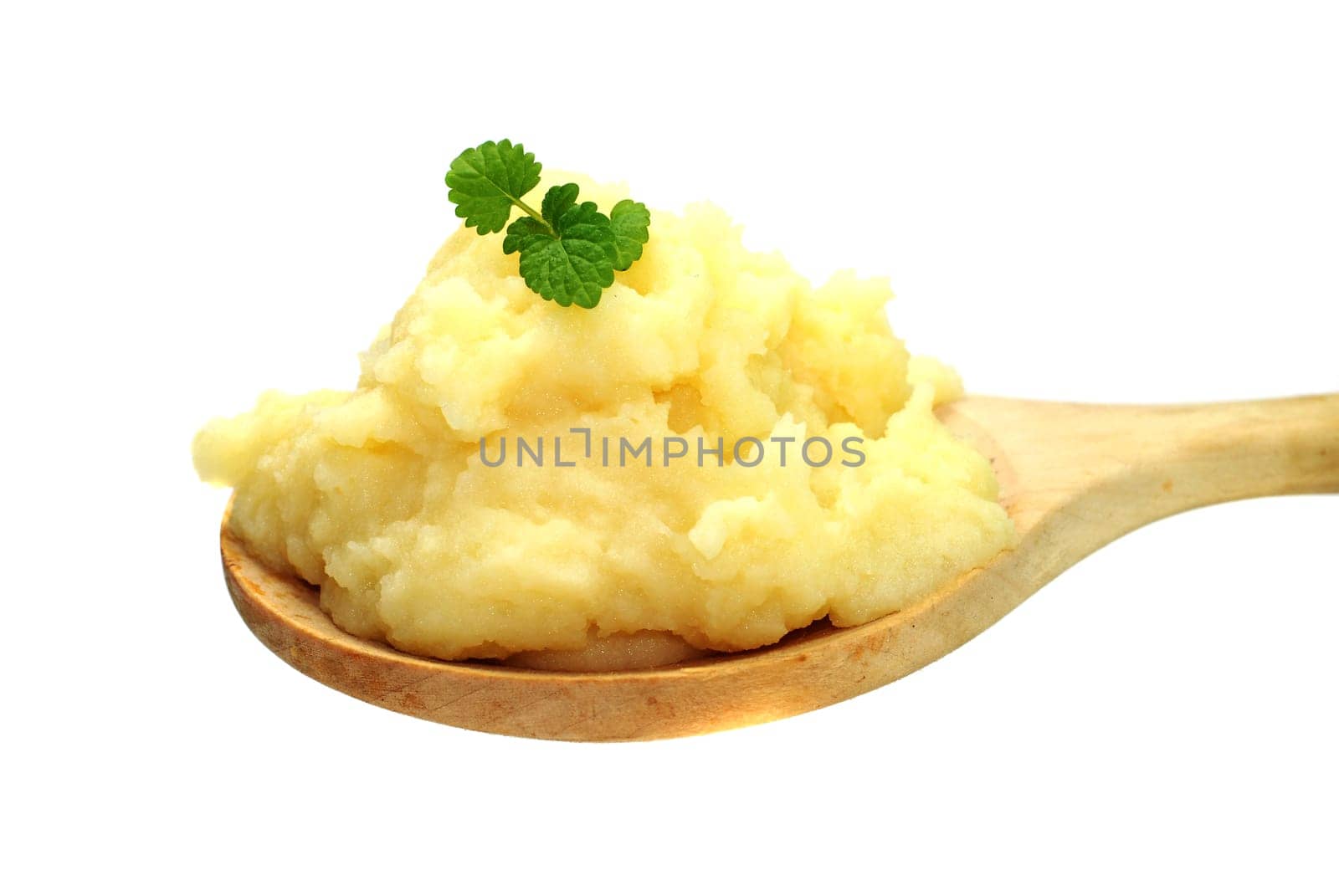 Mashed potatoes on wooden spoon